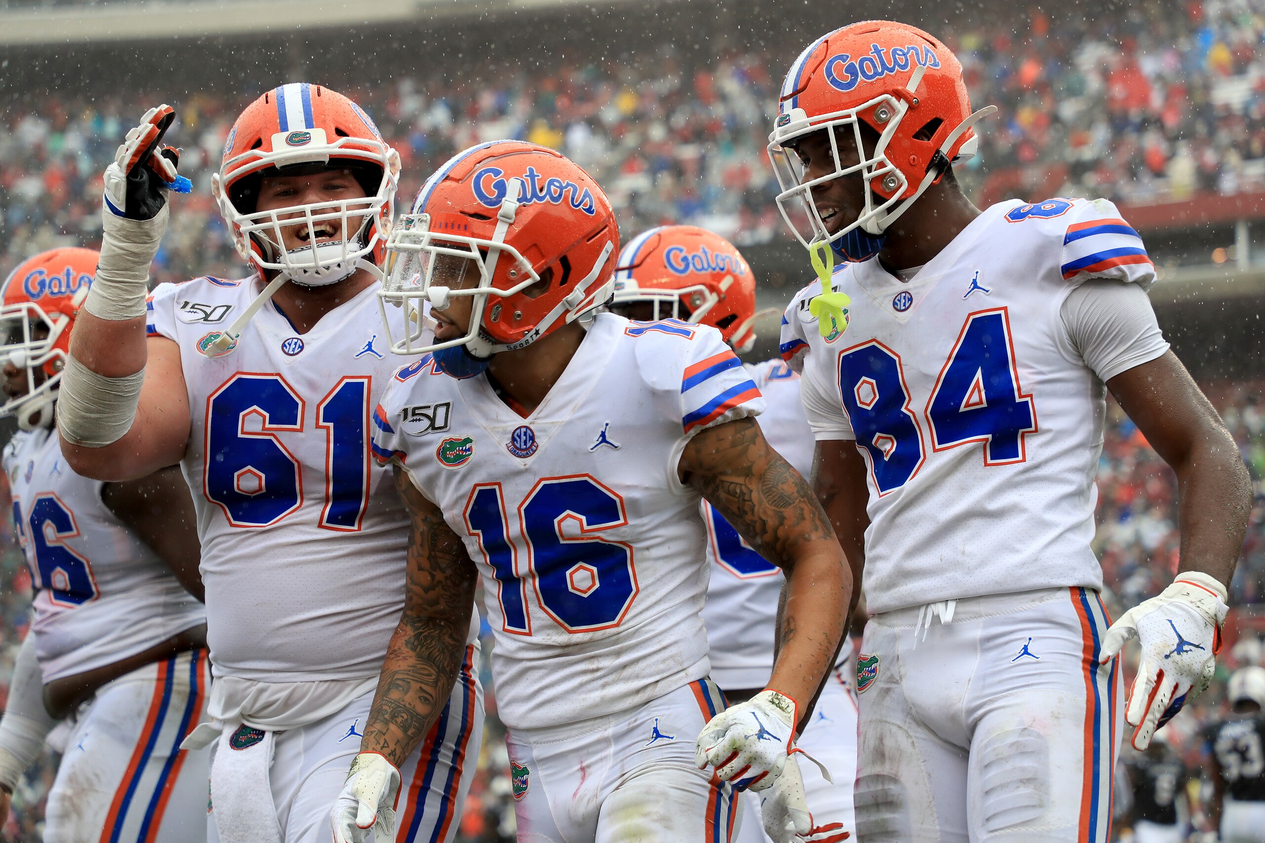 COLUMBIA, SOUTH CAROLINA - OCTOBER 19: Teammates Brett Heggie #61 and Kyle Pitts #84 celebrate after a touchdown by Freddie Swain #16 of the Florida Gators during their game against the South Carolina Gamecocks at Williams-Brice Stadium on October 19, 201