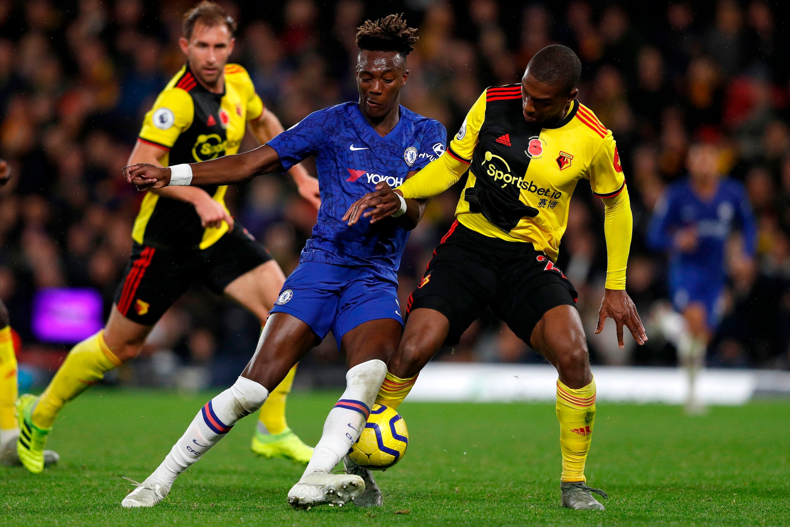 Chelsea's English striker Tammy Abraham (L) is tackled by Watford's Dutch defender Daryl Janmaat during the English Premier League football match between Watford and Chelsea at Vicarage Road Stadium in Watford, north of London on November 2, 2019. (Photo Chelsea's English striker Tammy Abraham (L) is tackled by Watford's Dutch defender Daryl Janmaat during the English Premier League football match between Watford and Chelsea at Vicarage Road Stadium in Watford, north of London on November 2, 2019. (Photo
