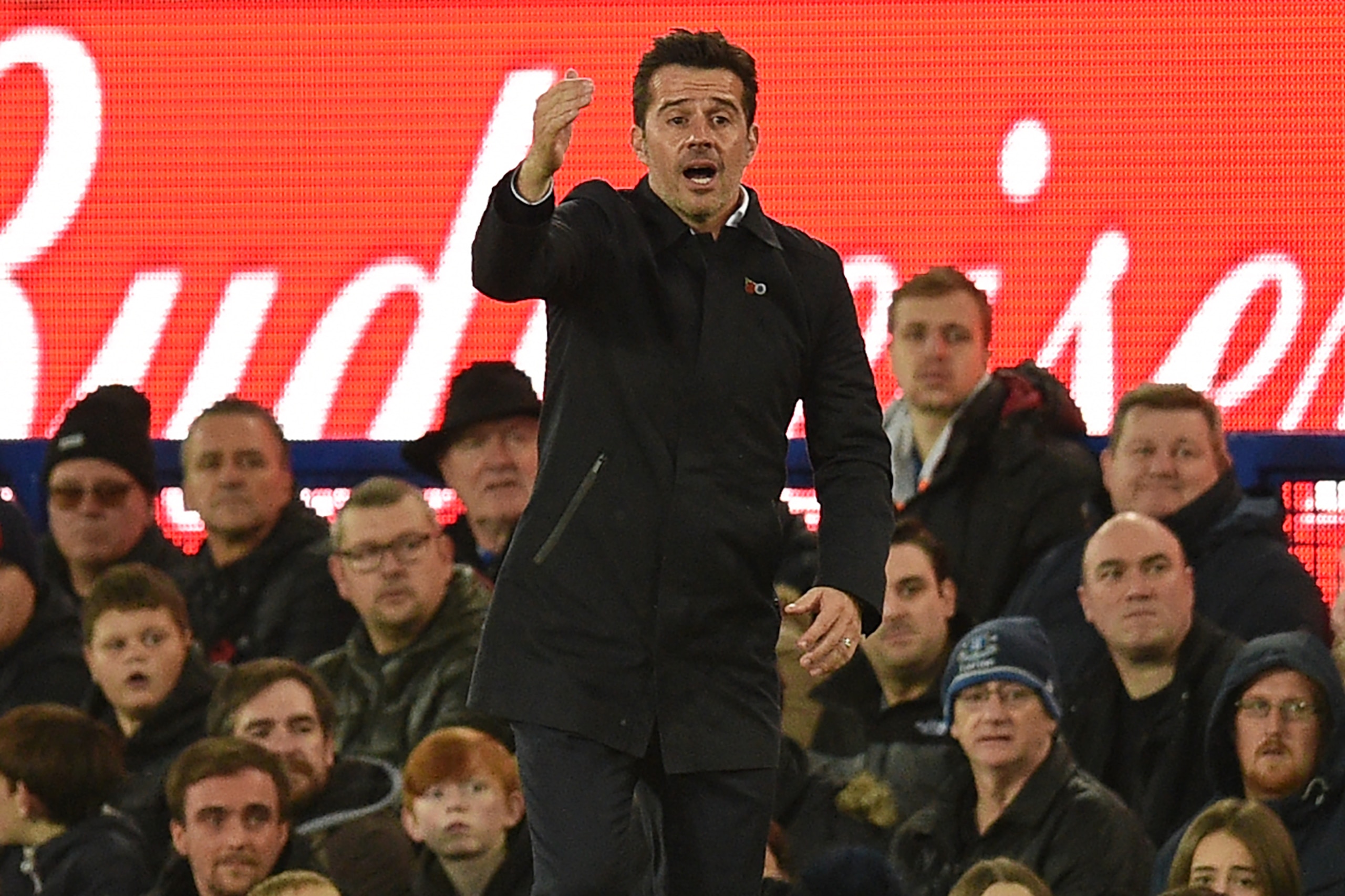 Everton's Portuguese manager Marco Silva shouts instructions to his players from the touchline during the English Premier League football match between Everton and Tottenham Hotspur at Goodison Park in Liverpool, north west England on November 3, 2019. (P
