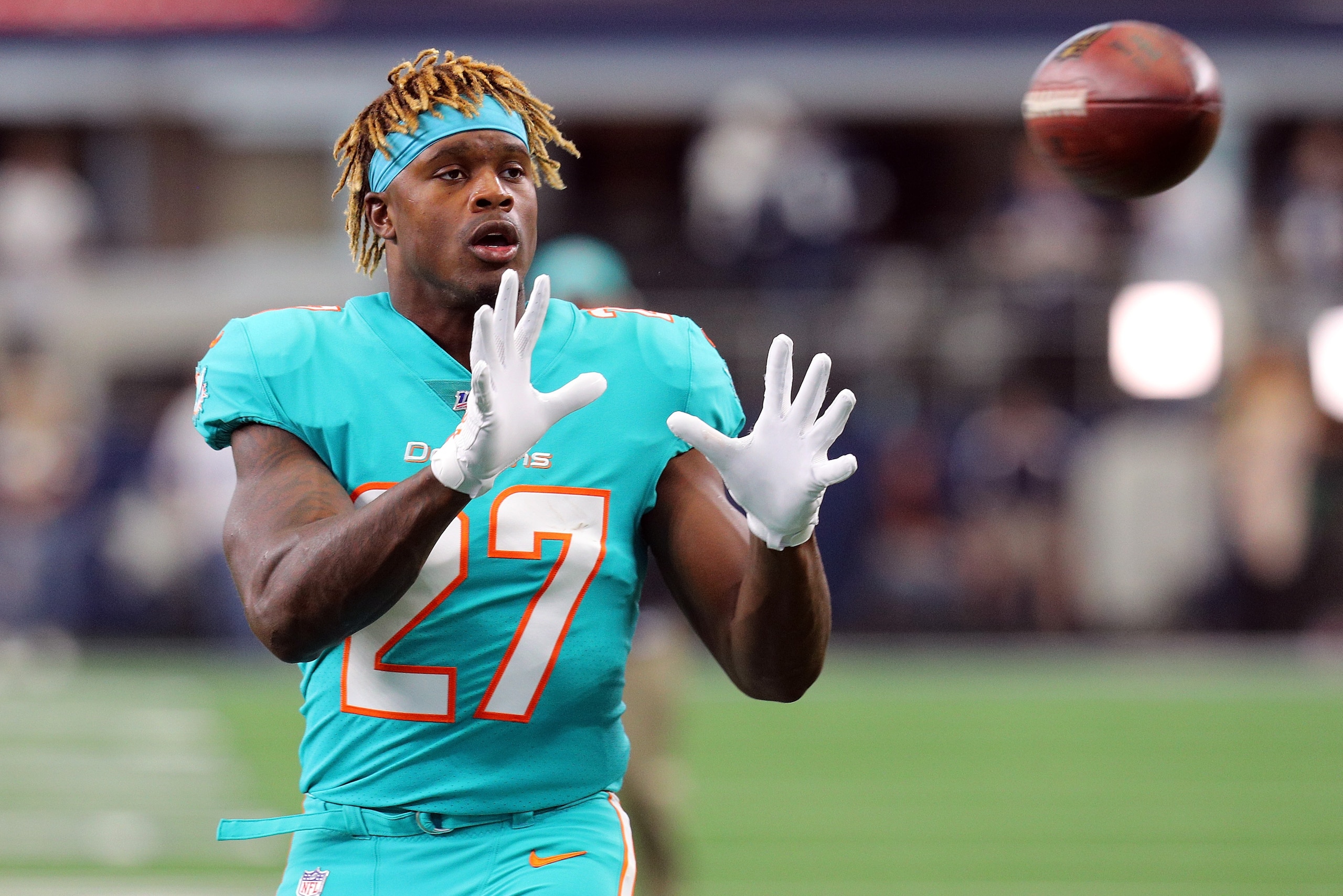 ARLINGTON, TEXAS - SEPTEMBER 22: Kalen Ballage #27 of the Miami Dolphins warms up before the game against the Dallas Cowboys at AT&T Stadium on September 22, 2019 in Arlington, Texas. (Photo by Richard Rodriguez/Getty Images)