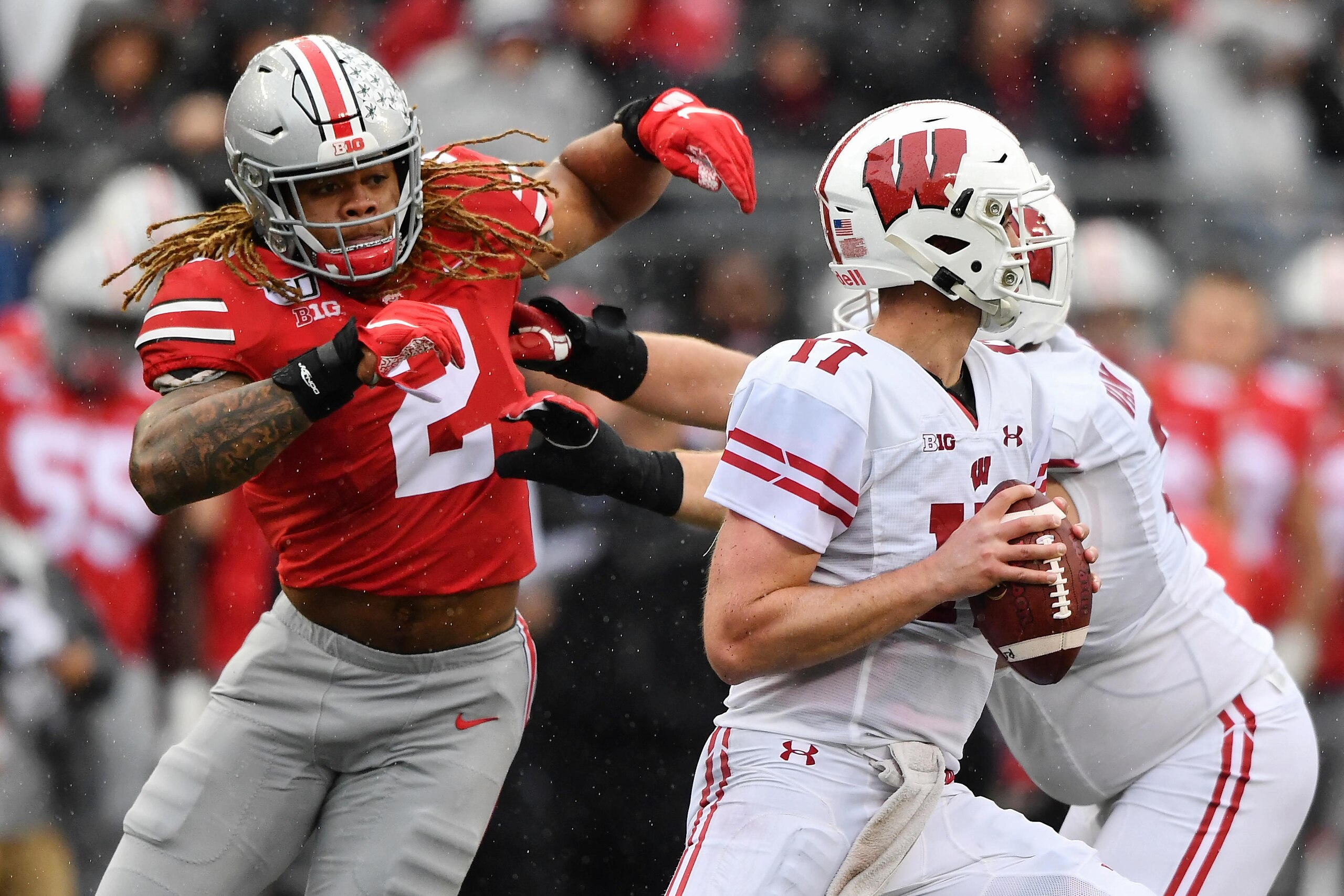 COLUMBUS, OH - OCTOBER 26:  Chase Young #2 of the Ohio State Buckeyes pressures the quarterback against the Wisconsin Badgers at Ohio Stadium on October 26, 2019 in Columbus, Ohio.  (Photo by Jamie Sabau/Getty Images)