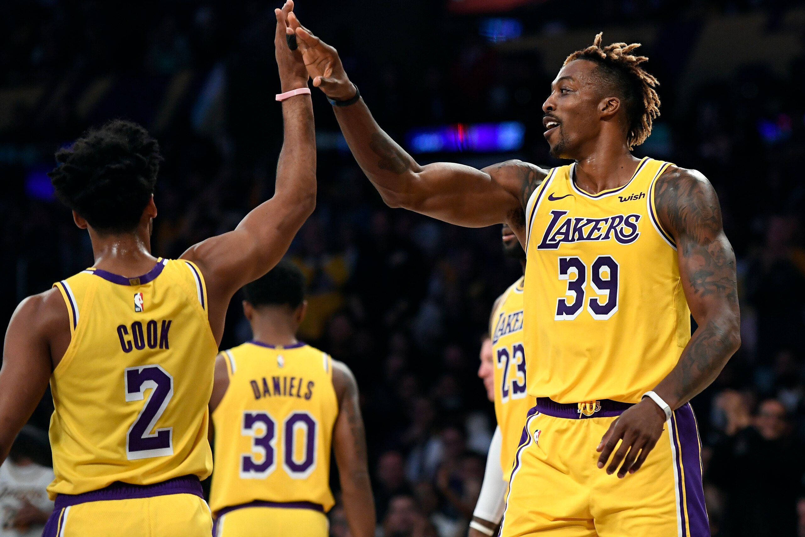 LOS ANGELES, CA - OCTOBER 29: Dwight Howard #39 of the Los Angeles Lakers is congratulated by Quinn Cook #2 of the Los Angeles Lakers after a blocked shot against Marko Guduric #23 of the Memphis Grizzlies during the second half of the basketball game at 