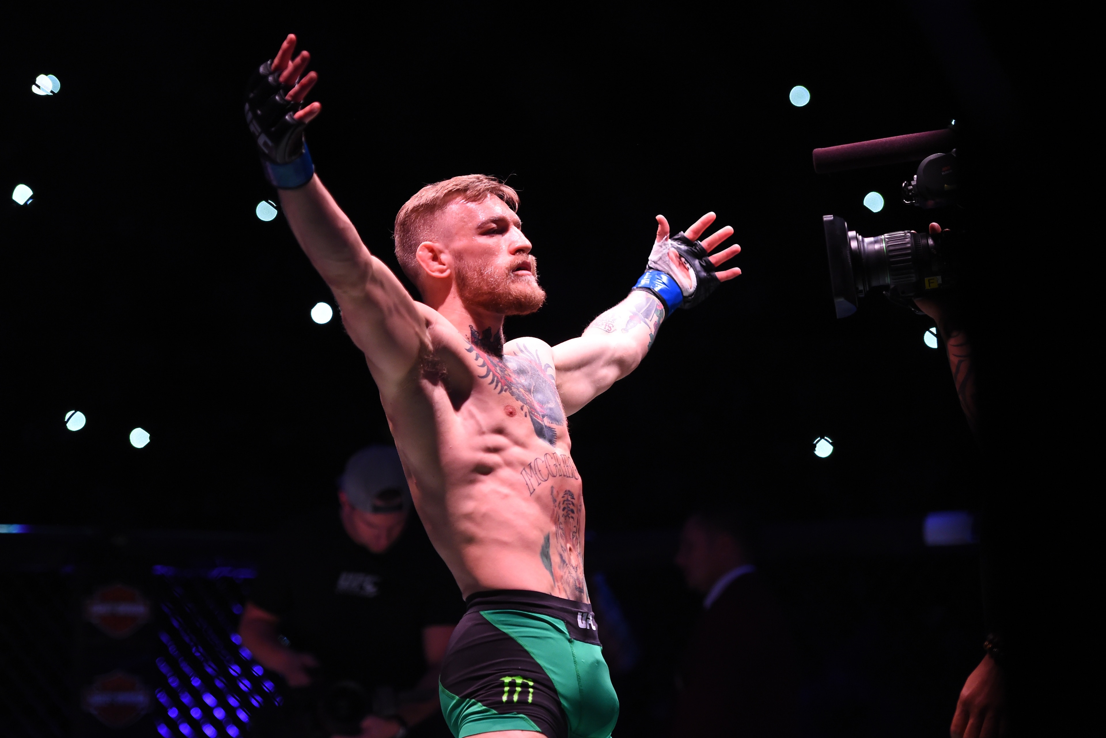 LAS VEGAS, NEVADA - DECEMBER 12:  Conor McGregor of Ireland is introduced to the crowd before facing Jose Aldo of Brazil in their featherweight championship bout during the UFC 194 event inside MGM Grand Garden Arena on December 12, 2015 in Las Vegas, Nev