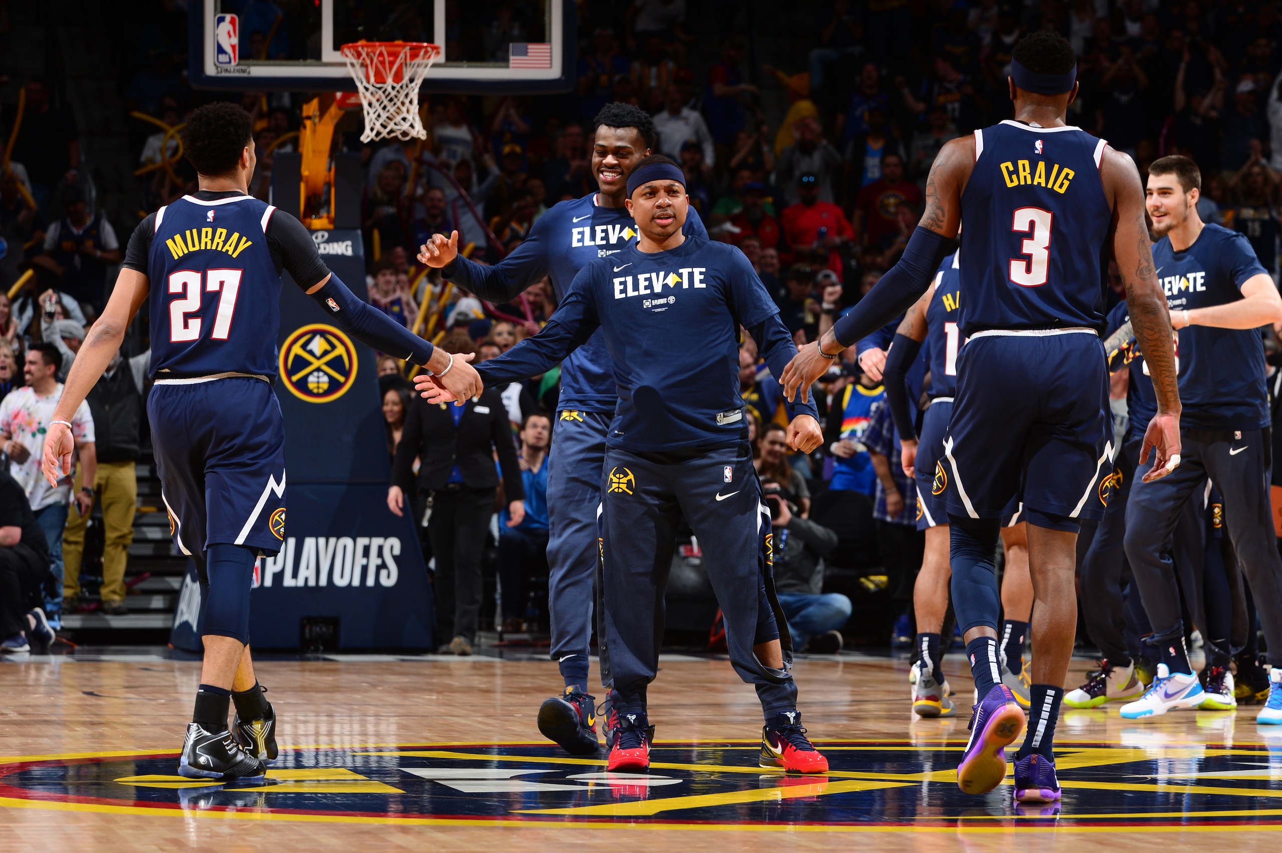 DENVER, CO - MAY 12: Isaiah Thomas #0 of the Denver Nuggets high-fives teammates against the Portland Trail Blazers during Game Seven of the Western Conference Semifinals of the 2019 NBA Playoffs on May 12, 2019 at the Pepsi Center in Denver, Colorado. NO