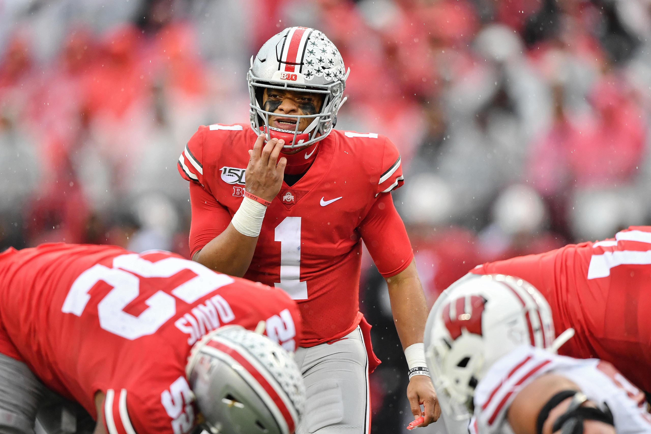 COLUMBUS, OH - OCTOBER 26: Quarterback Justin Fields #1 of the Ohio State Buckeyes calls signals against the Wisconsin Badgers at Ohio Stadium on October 26, 2019 in Columbus, Ohio. (Photo by Jamie Sabau/Getty Images) COLUMBUS, OH - OCTOBER 26: Quarterback Justin Fields #1 of the Ohio State Buckeyes calls signals against the Wisconsin Badgers at Ohio Stadium on October 26, 2019 in Columbus, Ohio. (Photo by Jamie Sabau/Getty Images)