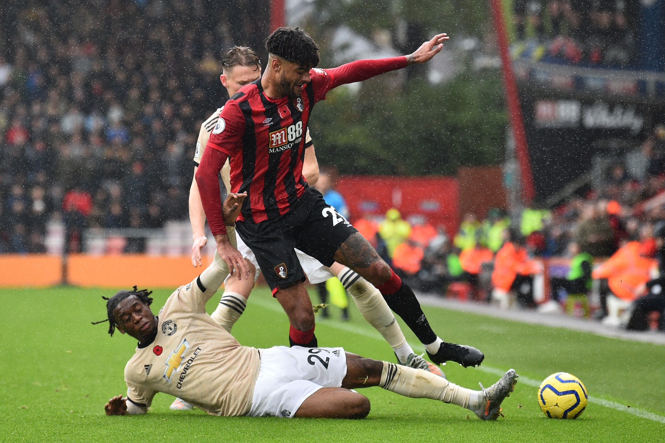 Manchester United's defender Aaron Wan-Bissaka (L) tackles Bournemouth's Danish midfielder Philip Billing (R) during the English Premier League football match between Bournemouth and Manchester United at the Vitality Stadium in Bournemouth, southern Engla Manchester United's defender Aaron Wan-Bissaka (L) tackles Bournemouth's Danish midfielder Philip Billing (R) during the English Premier League football match between Bournemouth and Manchester United at the Vitality Stadium in Bournemouth, southern Engla