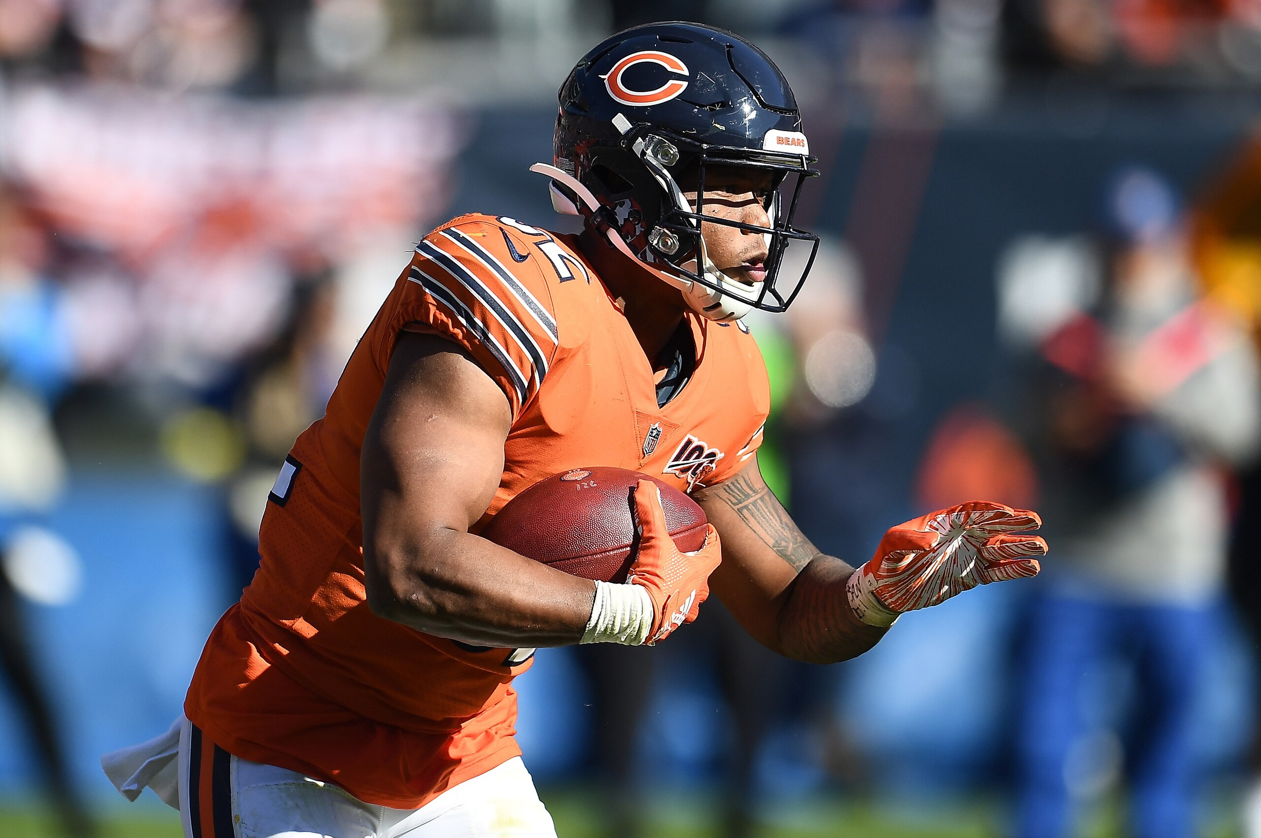 CHICAGO, ILLINOIS - OCTOBER 27:  David Montgomery #32 of the Chicago Bears runs for yards during a game against the Los Angeles Chargers at Soldier Field on October 27, 2019 in Chicago, Illinois. The Chargers defeated the Bears 17-16.  (Photo by Stacy Rev