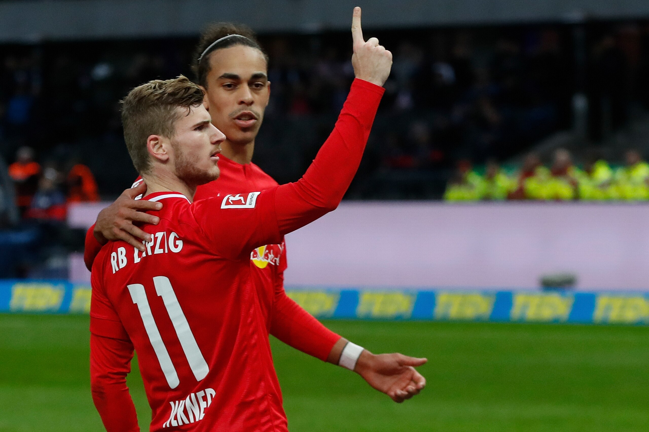 Leipzig's German forward Timo Werner celebrate scoring from the penalty spot with Leipzig's Danish forward Yussuf Poulsen during the German first division Bundesliga football match Hertha BSC Berlin v RB Leipzig, at the Olymic Stadium in Berlin on Novembe