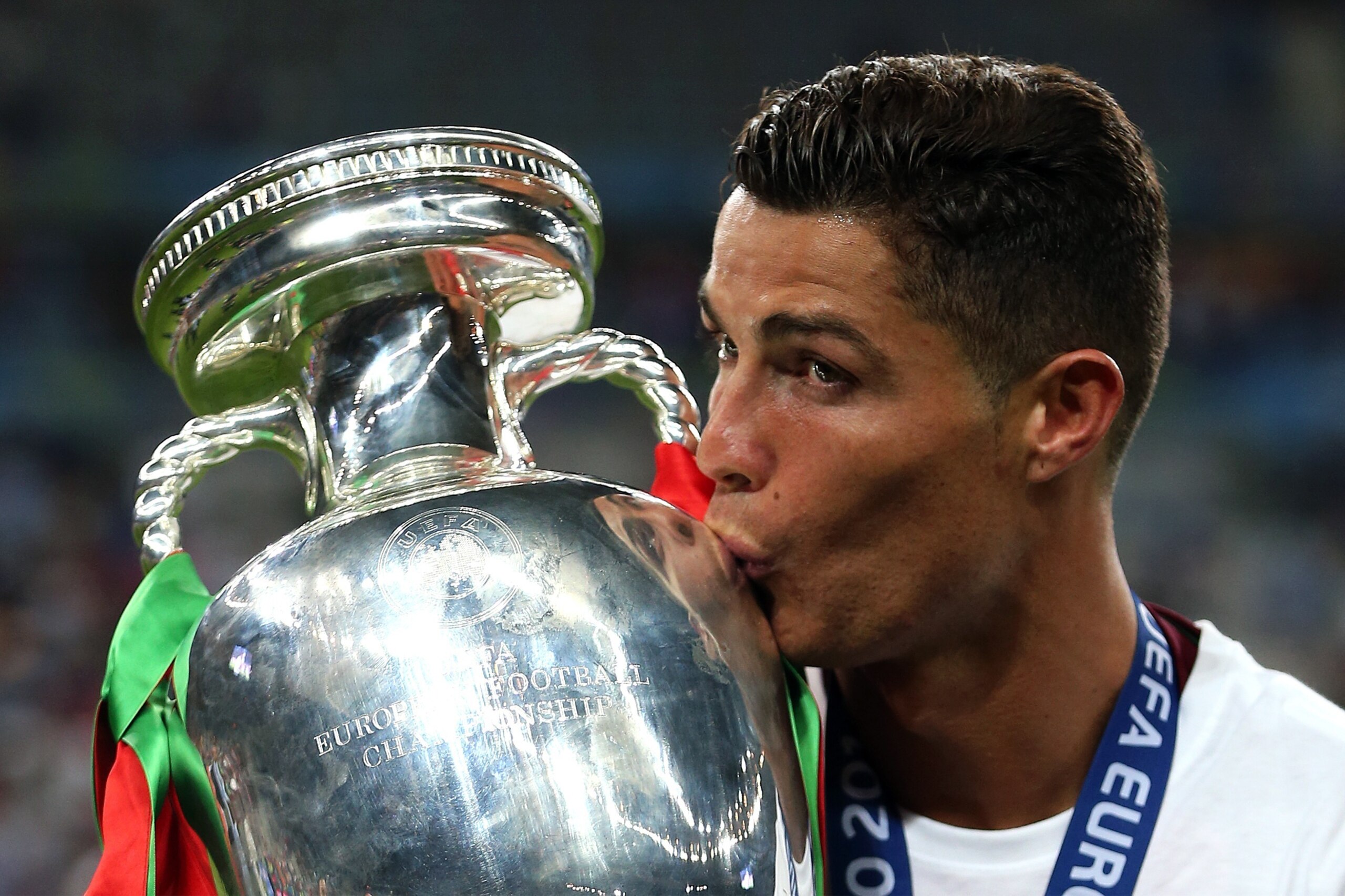 PARIS, FRANCE - JULY 10: Cristiano Ronaldo of Portugal kisses the trophy following the UEFA Euro 2016 Final match between Portugal and France at Stade de France on July 10, 2016 in Paris, France. (Photo by Chris Brunskill Ltd/Getty Images) PARIS, FRANCE - JULY 10: Cristiano Ronaldo of Portugal kisses the trophy following the UEFA Euro 2016 Final match between Portugal and France at Stade de France on July 10, 2016 in Paris, France. (Photo by Chris Brunskill Ltd/Getty Images)