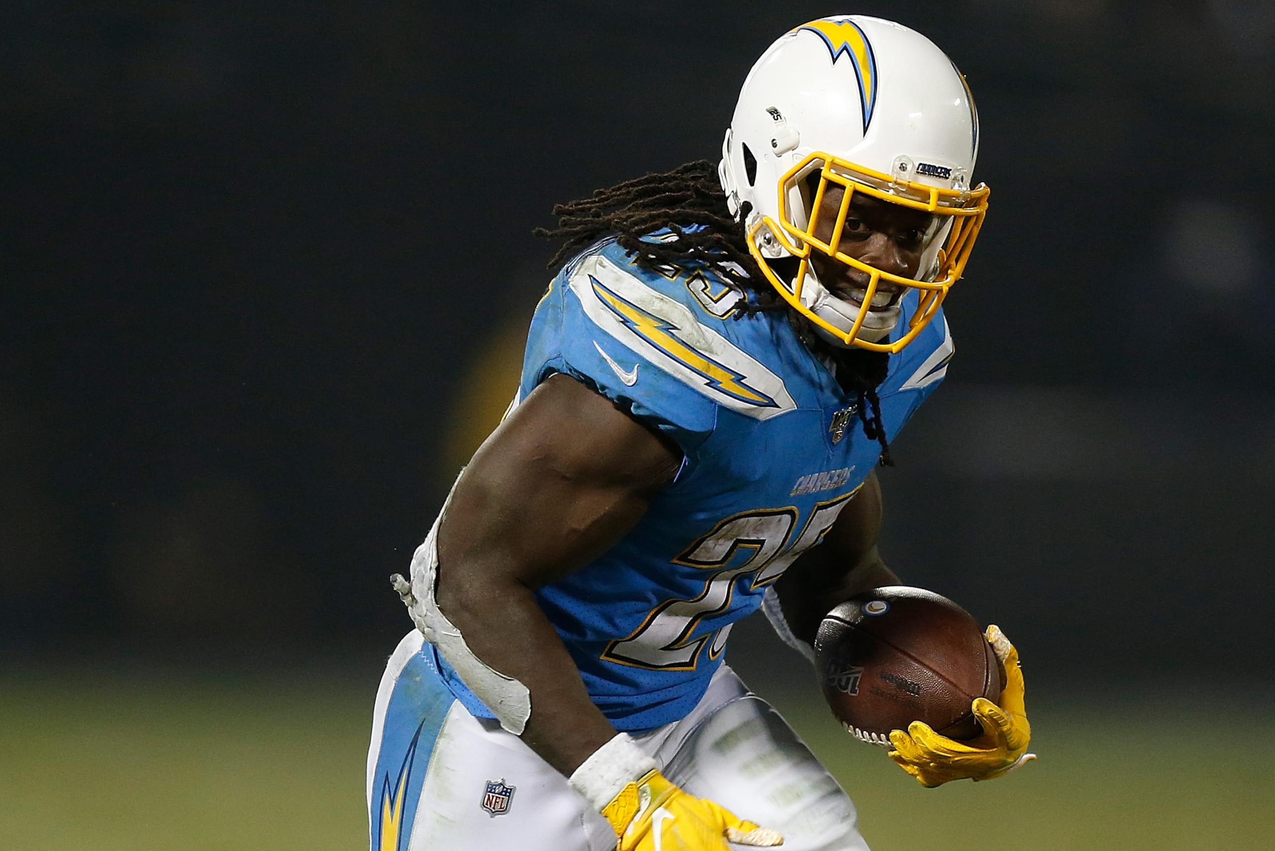 OAKLAND, CALIFORNIA - NOVEMBER 07: Melvin Gordon #25 of the Los Angeles Chargers runs the ball in the fourth quarter against the Oakland Raiders at RingCentral Coliseum on November 07, 2019 in Oakland, California. (Photo by Lachlan Cunningham/Getty Images