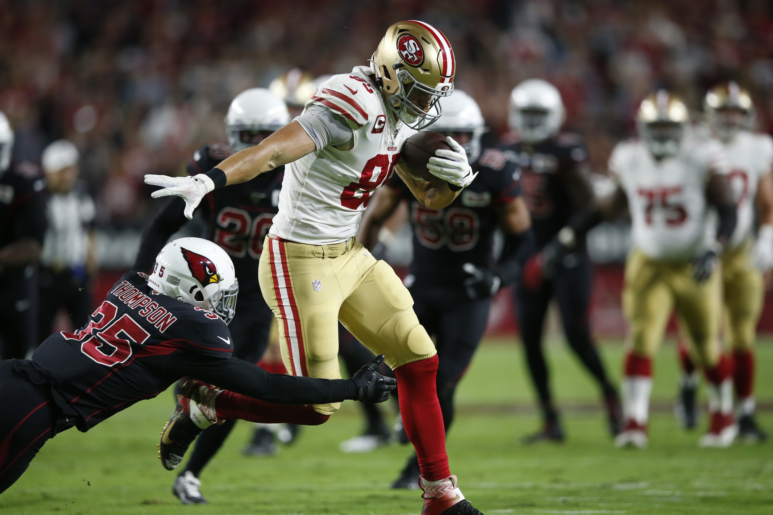 GLENDALE, AZ - OCTOBER 31: George Kittle #85 of the San Francisco 49ers makes a receptions and takes in to the end zone on for a 30-yard touchdown reception during the game against the Arizona Cardinals at State Farm Stadium on October 31, 2019 in Glendal