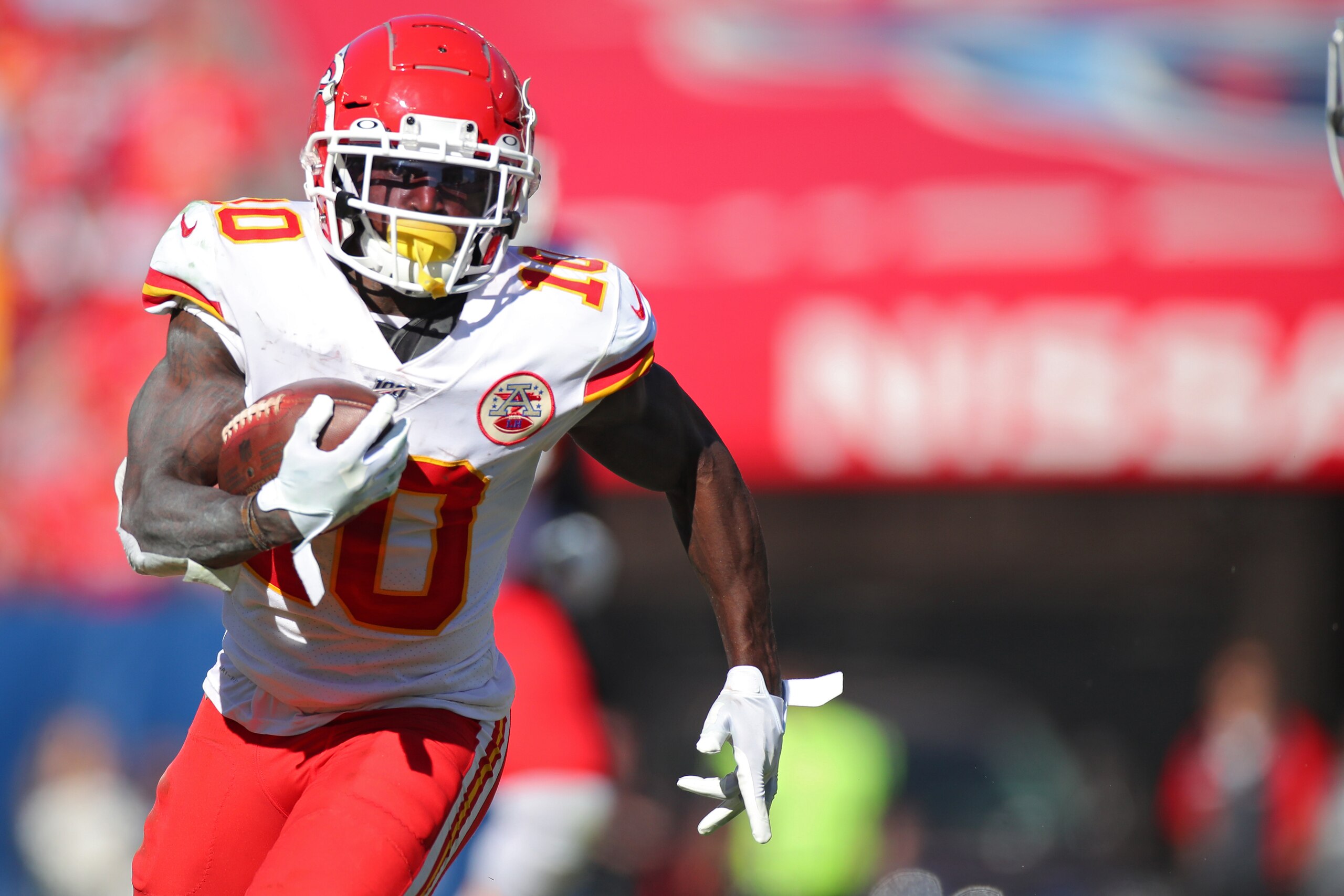 NASHVILLE, TENNESSEE - NOVEMBER 10: Wide receiver Tyreek Hill #10 of the Kansas City Chiefs rushes against the Tennessee Titans in the second quarter at Nissan Stadium on November 10, 2019 in Nashville, Tennessee. (Photo by Brett Carlsen/Getty Images)