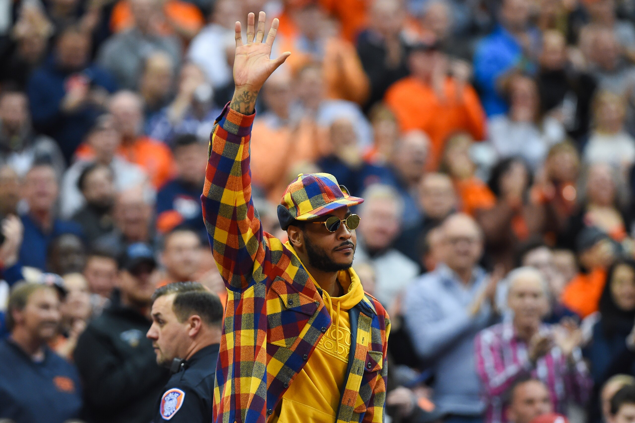 SYRACUSE, NY - NOVEMBER 06:  Syracuse Orange basketball alum Carmelo Anthony waves to the crowd prior to the game against the Virginia Cavaliers at the Carrier Dome on November 6, 2019 in Syracuse, New York. (Photo by Rich Barnes/Getty Images)
