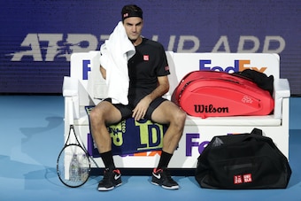 LONDON, ENGLAND - NOVEMBER 16: Roger Federer of Switzerland looks on as he sits down during a change of ends in his semi-final singles match against Stefanos Tsitsipas of Greece during Day Seven of the Nitto ATP World Tour Finals at The O2 Arena on Novemb