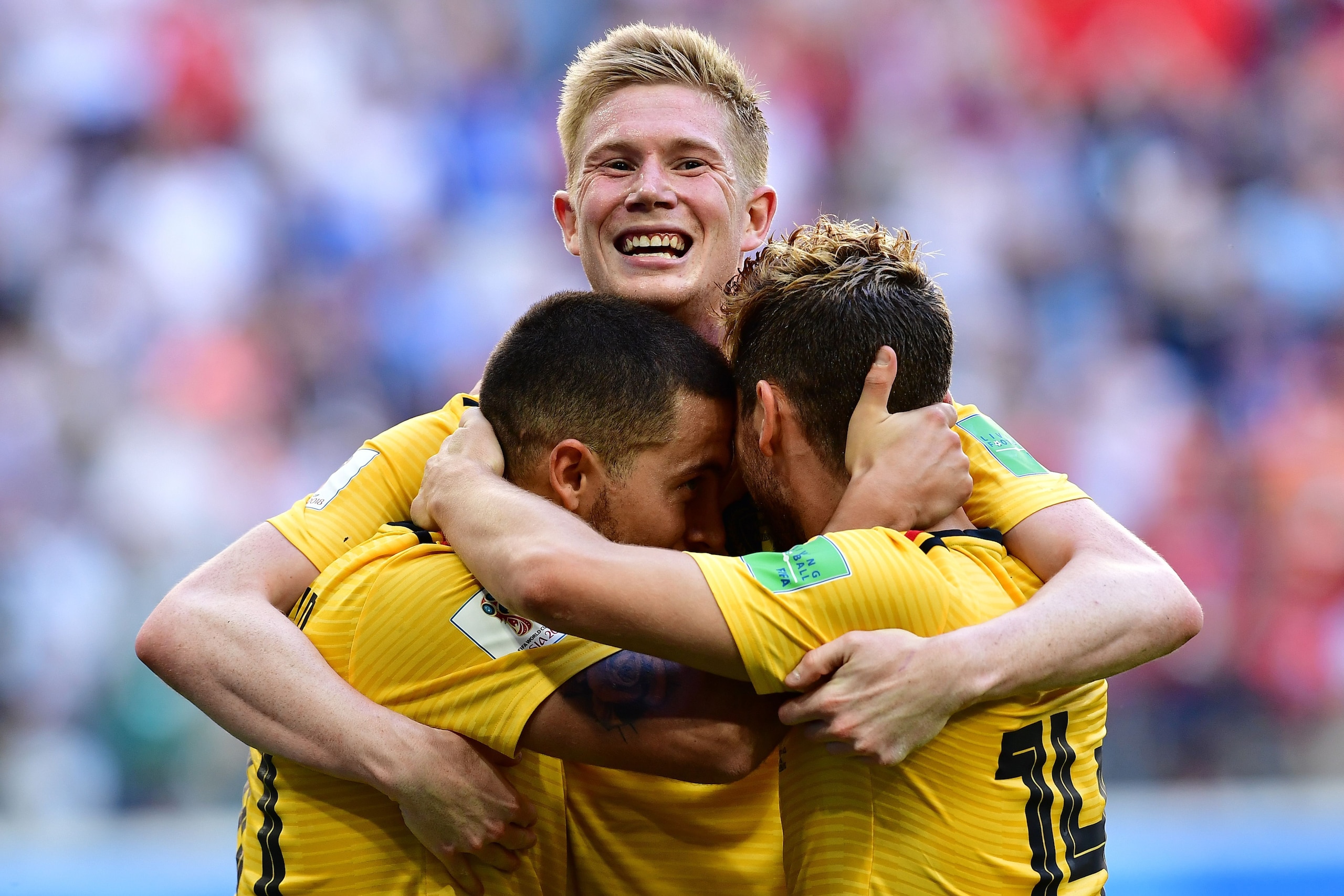 TOPSHOT - Belgium's forward Eden Hazard (L) celebrates with Belgium's forward Dries Mertens (R) and Belgium's midfielder Kevin De Bruyne after scoring their second goal during their Russia 2018 World Cup play-off for third place football match between Bel