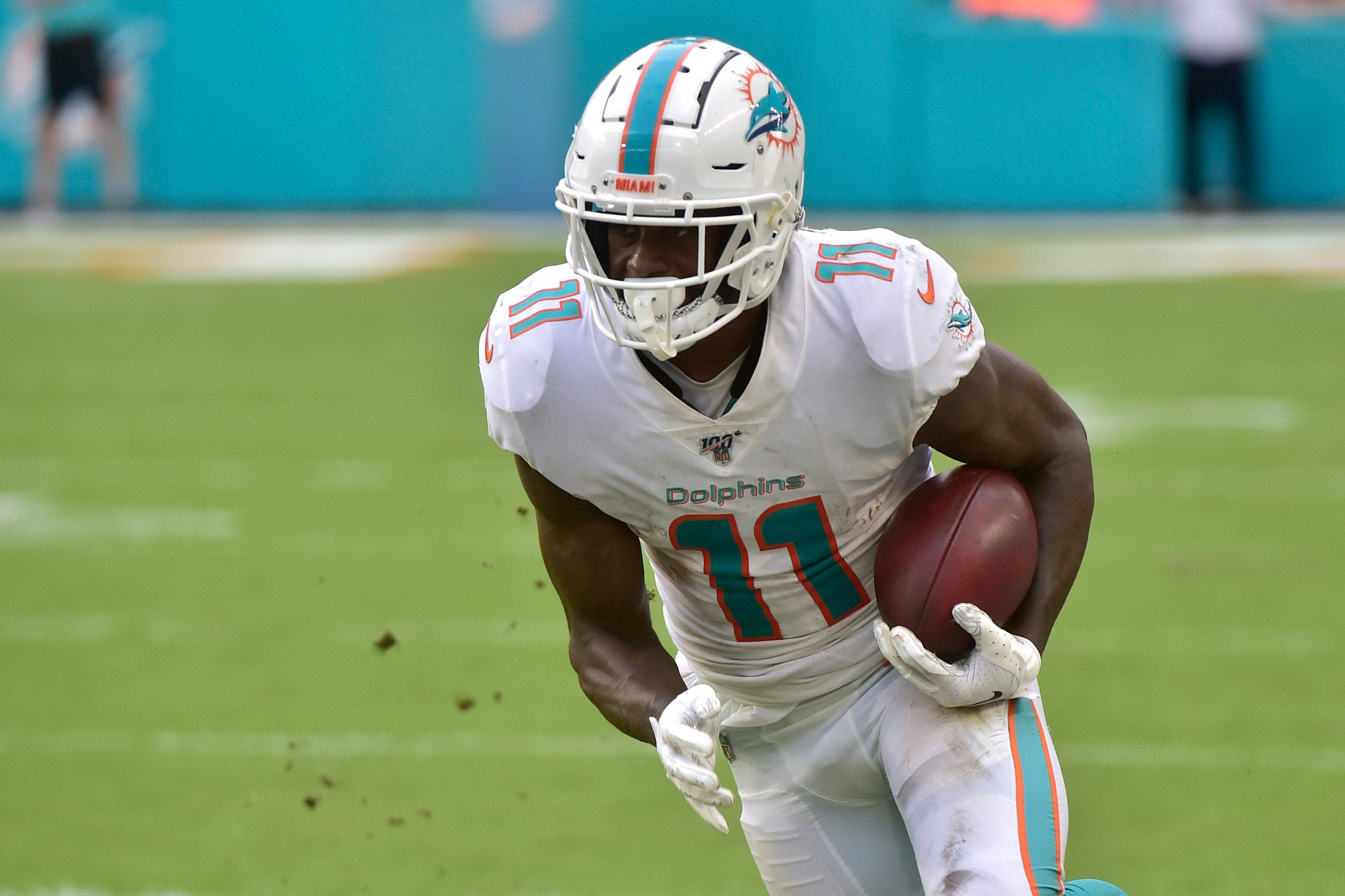 MIAMI, FL - NOVEMBER 03: DeVante Parker #11 of the Miami Dolphins runs up field after a catch during the fourth quarter against the New York Jets at Hard Rock Stadium on November 3, 2019 in Miami, Florida. (Photo by Eric Espada/Getty Images)