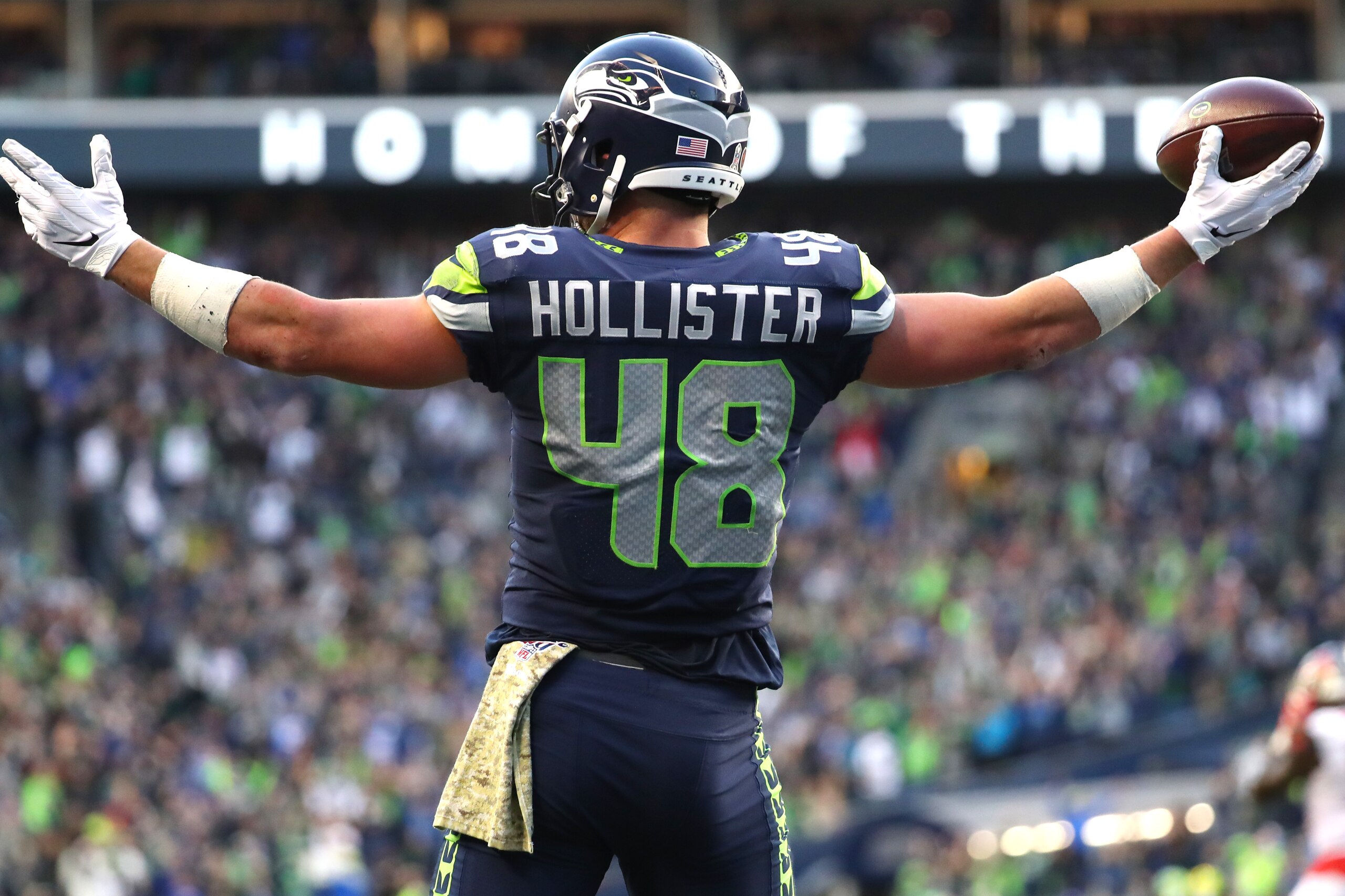 SEATTLE, WASHINGTON - NOVEMBER 03: Jacob Hollister #48 of the Seattle Seahawks celebrates after scoring the game-winning touchdown in overtime against the Tampa Bay Buccaneers during a game at CenturyLink Field on November 03, 2019 in Seattle, Washington.
