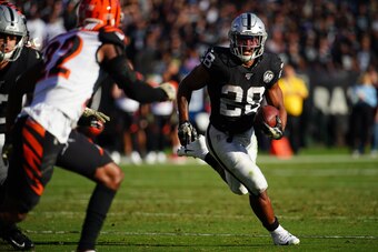 OAKLAND, CALIFORNIA - NOVEMBER 17: Josh Jacobs #28 of the Oakland Raiders runs the ball during the first half against the Cincinnati Bengals at RingCentral Coliseum on November 17, 2019 in Oakland, California. (Photo by Daniel Shirey/Getty Images)