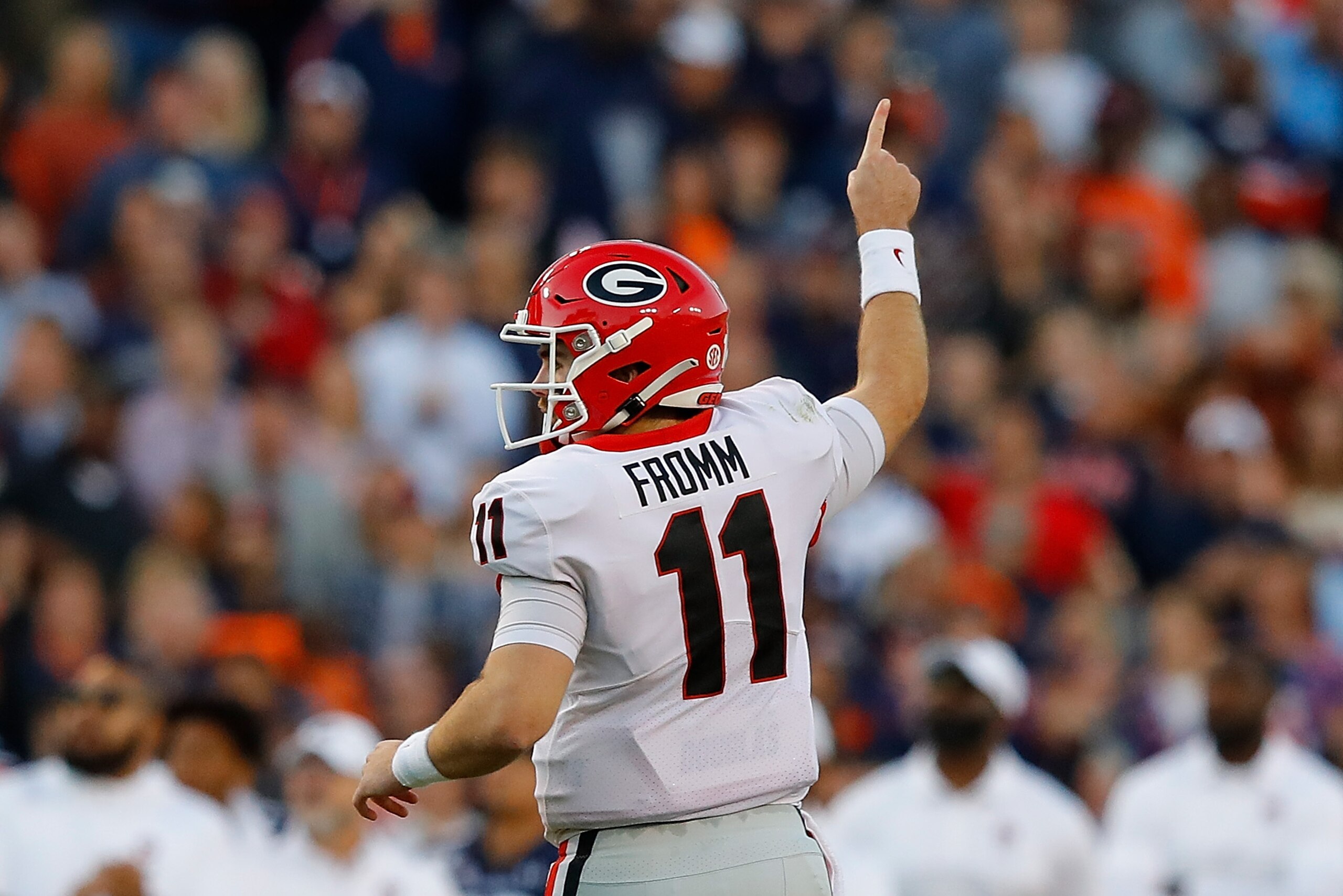 AUBURN, ALABAMA - NOVEMBER 16:  Jake Fromm #11 of the Georgia Bulldogs reacts after passing for a touchdown against the Auburn Tigers in the first half at Jordan-Hare Stadium on November 16, 2019 in Auburn, Alabama. (Photo by Kevin C. Cox/Getty Images)