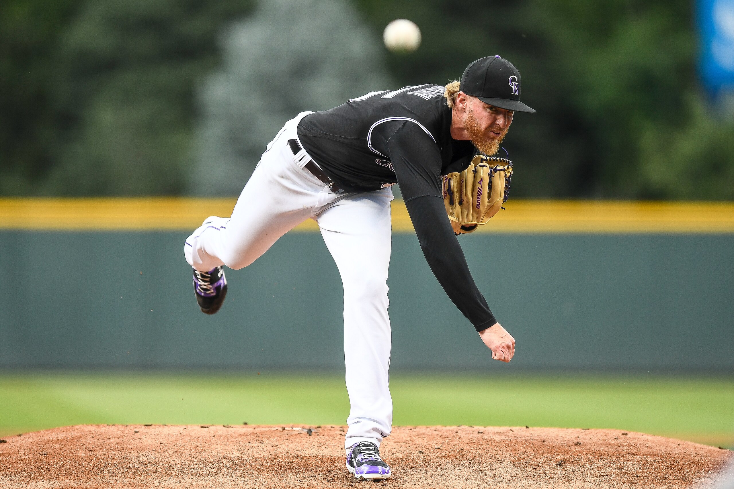 DENVER, CO - AUGUST 16:  Jon Gray #55 of the Colorado Rockies pitches against the Miami Marlins in the first inning of a game  at Coors Field on August 16, 2019 in Denver, Colorado. (Photo by Dustin Bradford/Getty Images)