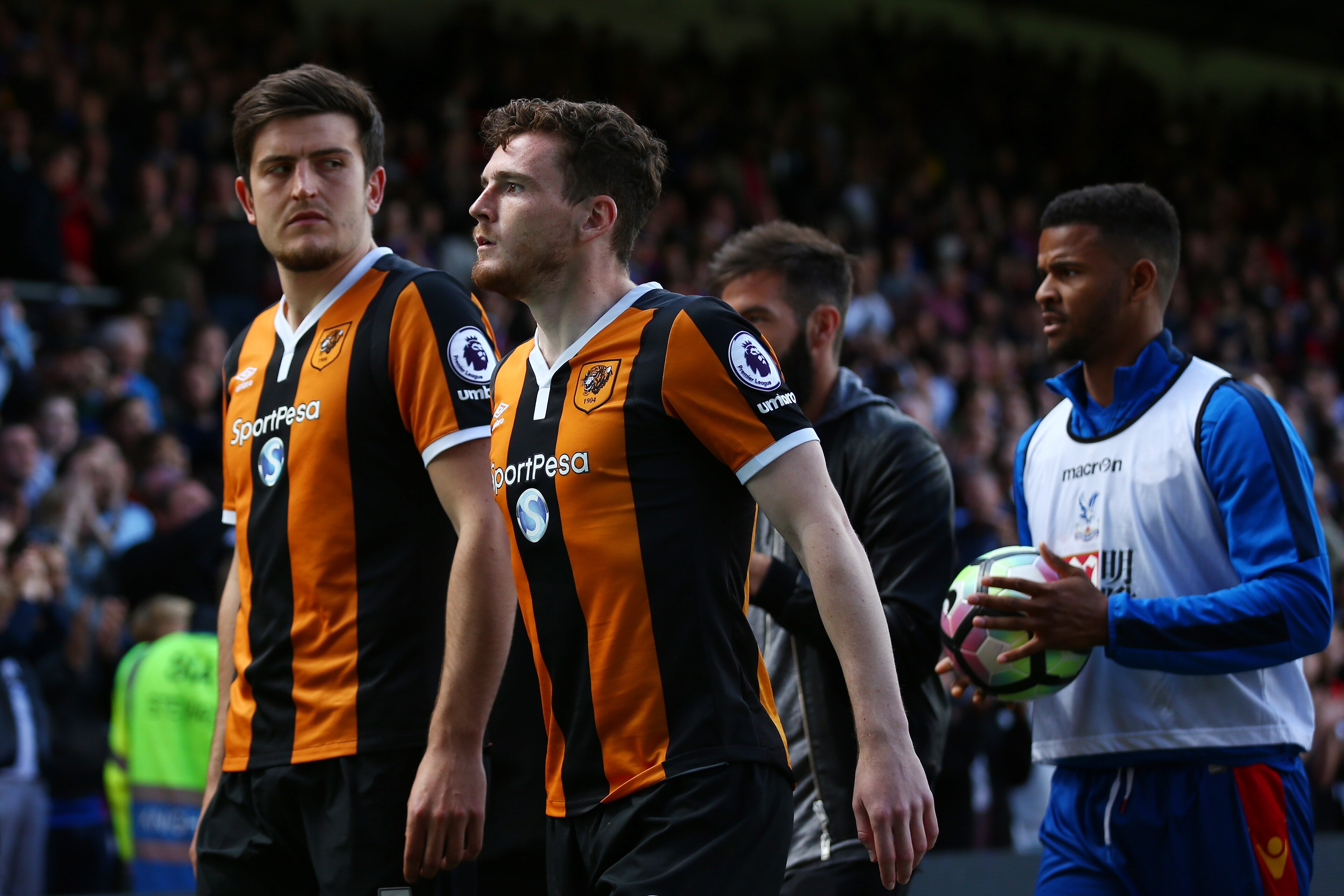 LONDON, ENGLAND - MAY 14: Harry Maguire of Hull City and Andrew Robertson of Hull City leave the pitch looking dejected after being relegated to the Championship after the Premier League match between Crystal Palace and Hull City at Selhurst Park on May 1 LONDON, ENGLAND - MAY 14: Harry Maguire of Hull City and Andrew Robertson of Hull City leave the pitch looking dejected after being relegated to the Championship after the Premier League match between Crystal Palace and Hull City at Selhurst Park on May 1