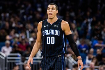 ORLANDO, FLORIDA - NOVEMBER 15: Aaron Gordon #00 of the Orlando Magic between plays against the San Antonio Spurs in the first quarter at Amway Center on November 15, 2019 in Orlando, Florida. NOTE TO USER: User expressly acknowledges and agrees that, by 