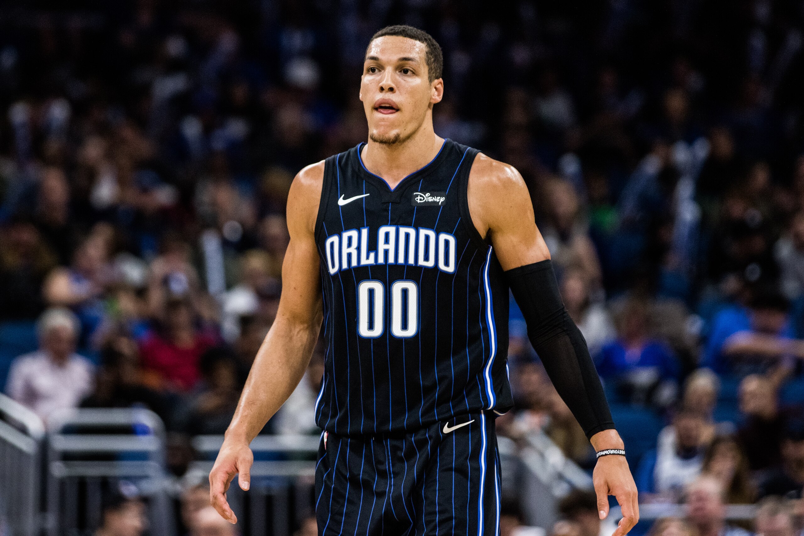 ORLANDO, FLORIDA - NOVEMBER 15: Aaron Gordon #00 of the Orlando Magic between plays against the San Antonio Spurs in the first quarter at Amway Center on November 15, 2019 in Orlando, Florida. NOTE TO USER: User expressly acknowledges and agrees that, by 