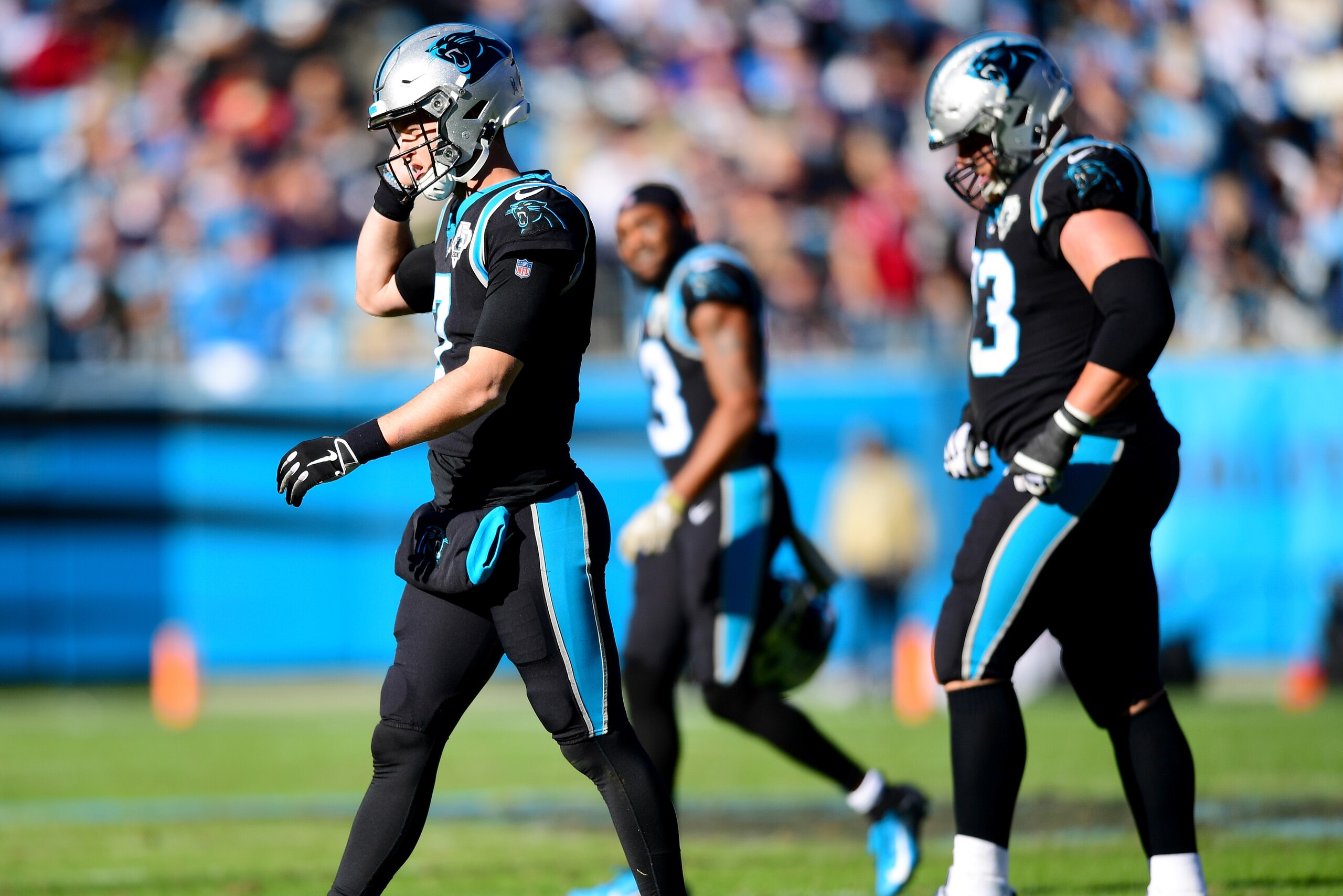 CHARLOTTE, NORTH CAROLINA - NOVEMBER 17: Kyle Allen #7 of the Carolina Panthers walks off the field after an interception during the second quarter during their game against the Atlanta Falcons at Bank of America Stadium on November 17, 2019 in Charlotte,