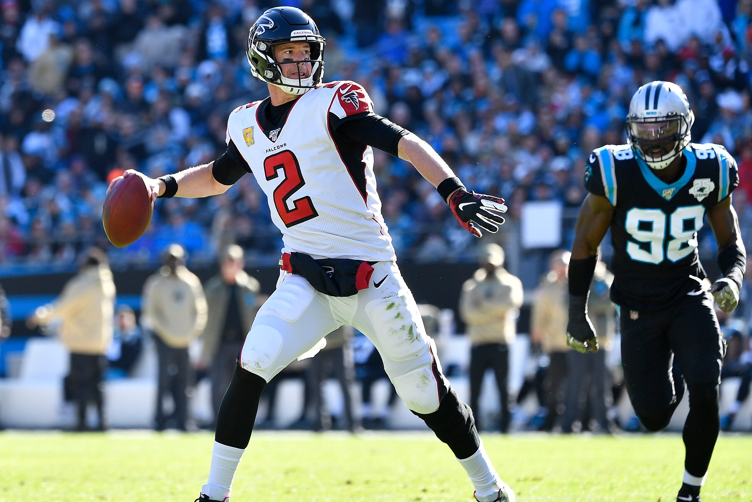 CHARLOTTE, NORTH CAROLINA - NOVEMBER 17: Matt Ryan #2 of the Atlanta Falcons rolls out against the Carolina Panthers during the second quarter of their game at Bank of America Stadium on November 17, 2019 in Charlotte, North Carolina. (Photo by Grant Halv CHARLOTTE, NORTH CAROLINA - NOVEMBER 17: Matt Ryan #2 of the Atlanta Falcons rolls out against the Carolina Panthers during the second quarter of their game at Bank of America Stadium on November 17, 2019 in Charlotte, North Carolina. (Photo by Grant Halv