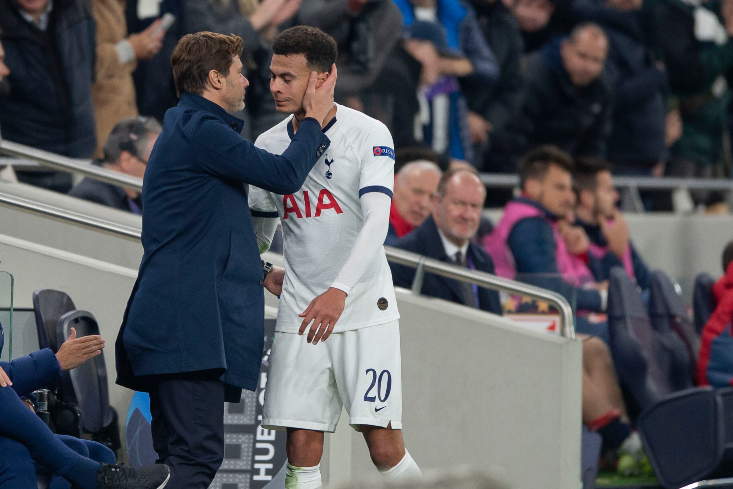 LONDON, ENGLAND - OCTOBER 22: Dele Alli of Tottenham Hotspur speaks with Manager Mauricio Pochettino of Tottenham Hotspur during the UEFA Champions League group B match between Tottenham Hotspur and Crvena Zvezda at Tottenham Hotspur Stadium on October 22