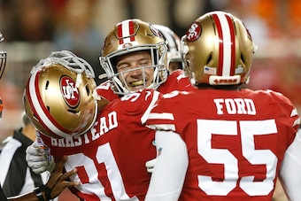 SANTA CLARA, CALIFORNIA - OCTOBER 07: Nick Bosa #97 of the San Francisco 49ers celebrates with Arik Armstead #91 and Dee Ford #55 after sacking quarterback Baker Mayfield #6 of the Cleveland Browns at Levi's Stadium on October 07, 2019 in Santa Clara, Cal