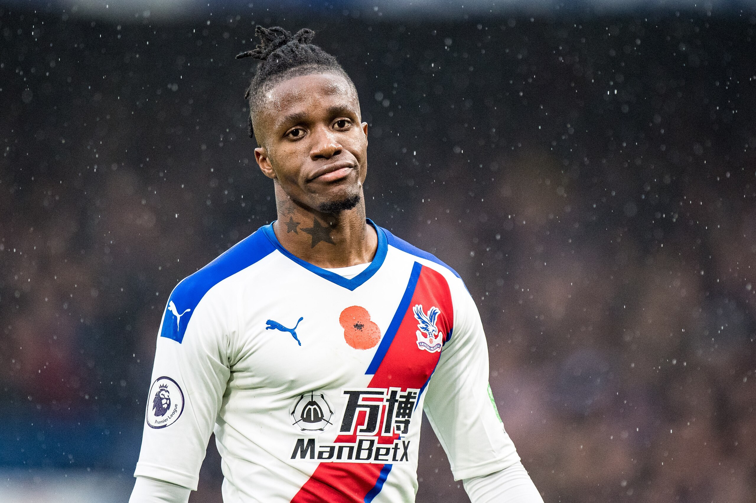 LONDON, ENGLAND - NOVEMBER 09: Wilfried Zaha of Crystal Palace during the Premier League match between Chelsea FC and Crystal Palace at Stamford Bridge on November 9, 2019 in London, United Kingdom. (Photo by Sebastian Frej/MB Media/Getty Images) LONDON, ENGLAND - NOVEMBER 09: Wilfried Zaha of Crystal Palace during the Premier League match between Chelsea FC and Crystal Palace at Stamford Bridge on November 9, 2019 in London, United Kingdom. (Photo by Sebastian Frej/MB Media/Getty Images)