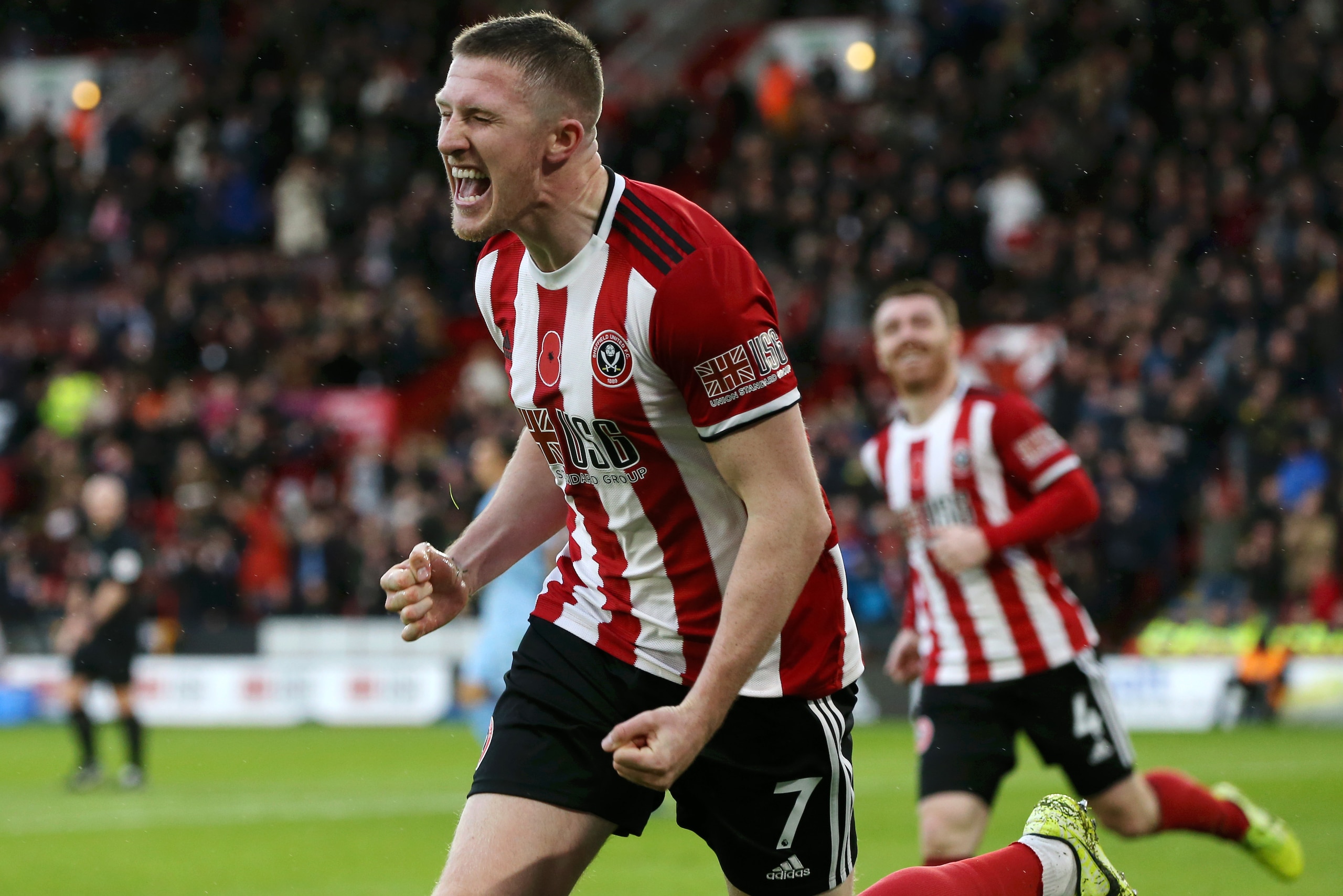 SHEFFIELD, ENGLAND - NOVEMBER 02: John Lundstram of Sheffield United celebrates after scoring his team's second goal during the Premier League match between Sheffield United and Burnley FC at Bramall Lane on November 02, 2019 in Sheffield, United Kingdom.