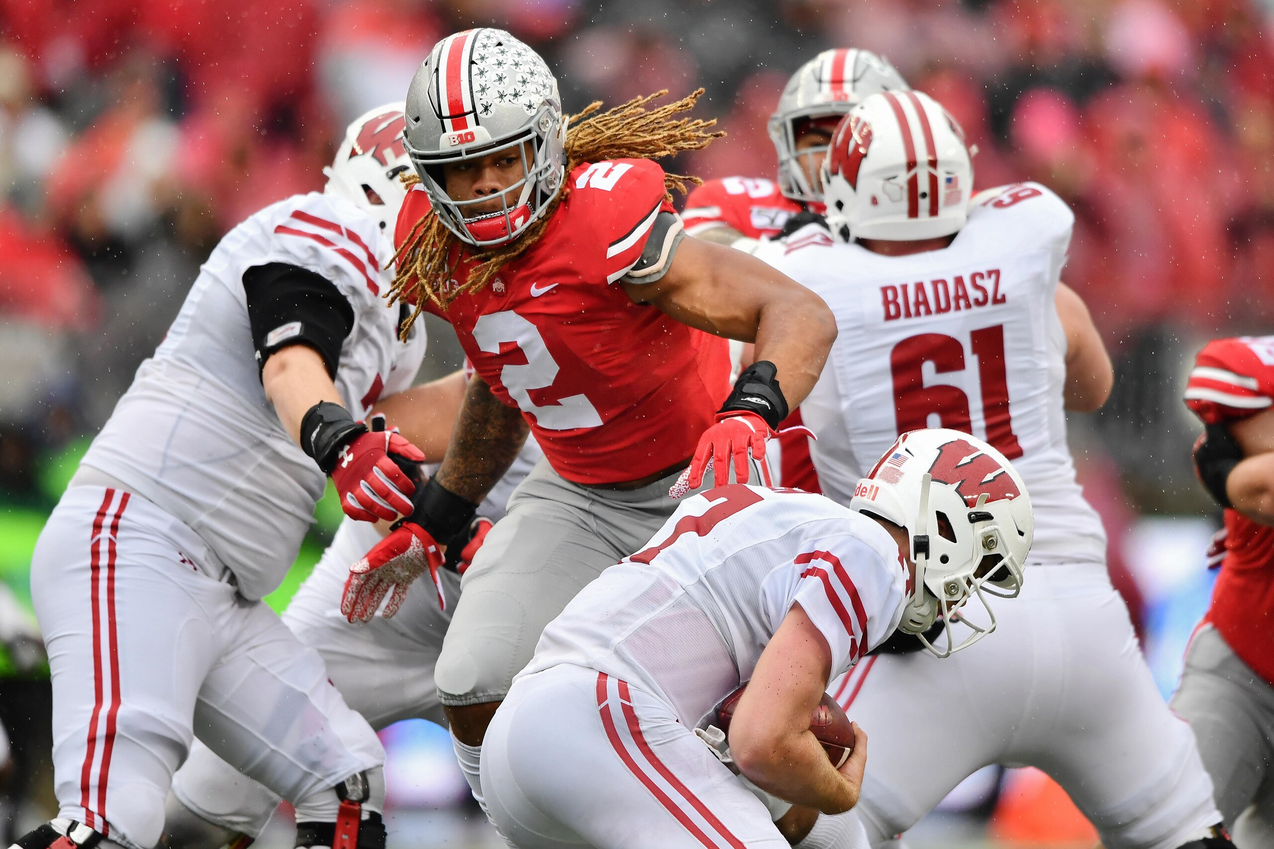 COLUMBUS, OH - OCTOBER 26:  Chase Young #2 of the Ohio State Buckeyes pressures the quarterback against the Wisconsin Badgers at Ohio Stadium on October 26, 2019 in Columbus, Ohio.  (Photo by Jamie Sabau/Getty Images)