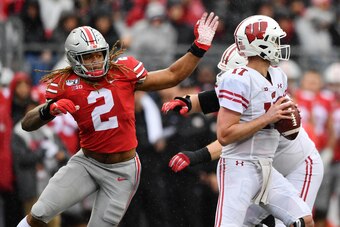 COLUMBUS, OH - OCTOBER 26:  Chase Young #2 of the Ohio State Buckeyes pressures the quarterback against the Wisconsin Badgers at Ohio Stadium on October 26, 2019 in Columbus, Ohio.  (Photo by Jamie Sabau/Getty Images)