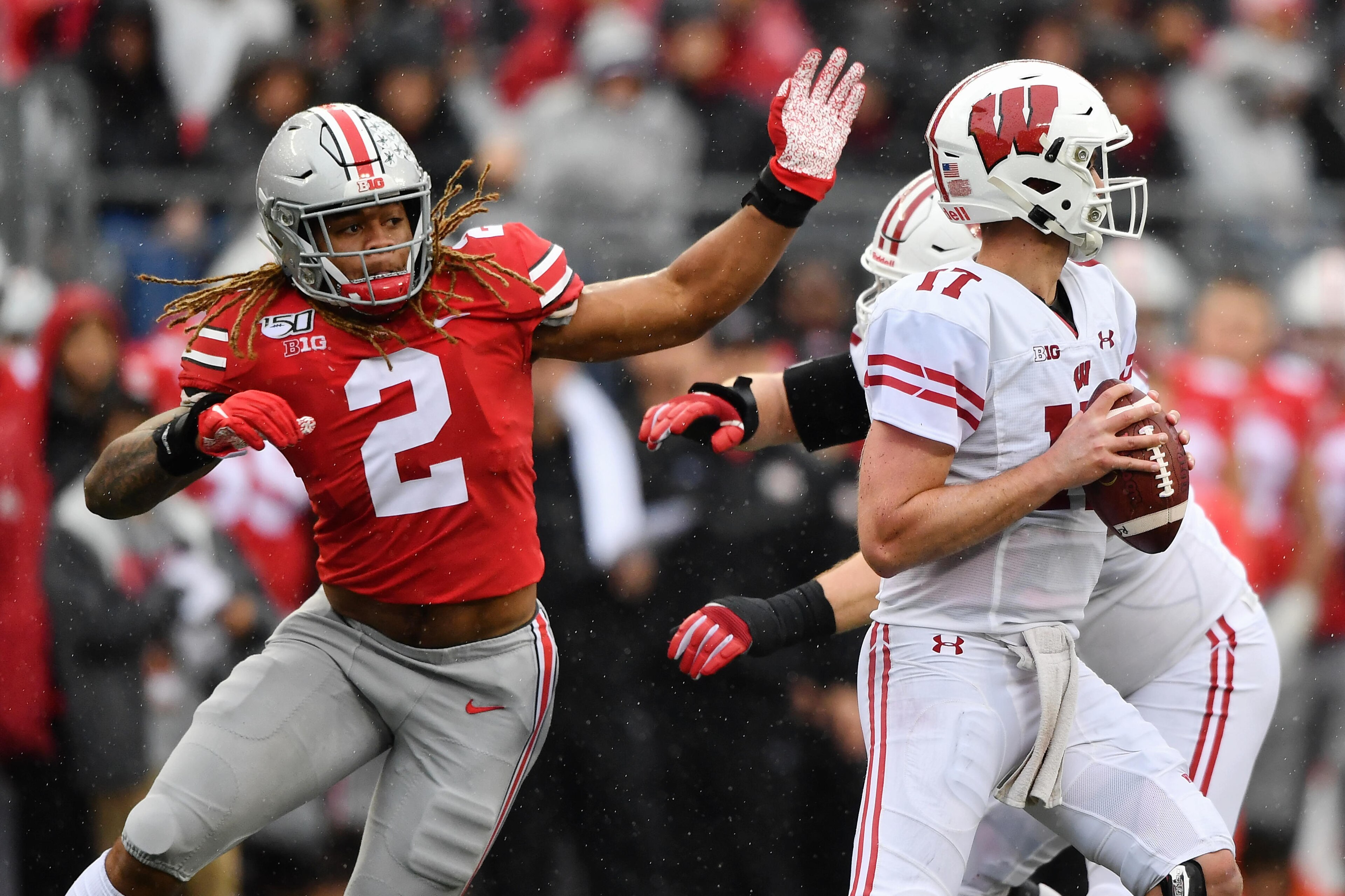 COLUMBUS, OH - OCTOBER 26: Chase Young #2 of the Ohio State Buckeyes pressures the quarterback against the Wisconsin Badgers at Ohio Stadium on October 26, 2019 in Columbus, Ohio. (Photo by Jamie Sabau/Getty Images) COLUMBUS, OH - OCTOBER 26: Chase Young #2 of the Ohio State Buckeyes pressures the quarterback against the Wisconsin Badgers at Ohio Stadium on October 26, 2019 in Columbus, Ohio. (Photo by Jamie Sabau/Getty Images)