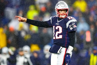 FOXBOROUGH, MA - NOVEMBER 24:   Tom Brady #12 of the New England reacts during a game against the Dallas Cowboys at Gillette Stadium on November 24, 2019 in Foxborough, Massachusetts.  (Photo by Adam Glanzman/Getty Images)