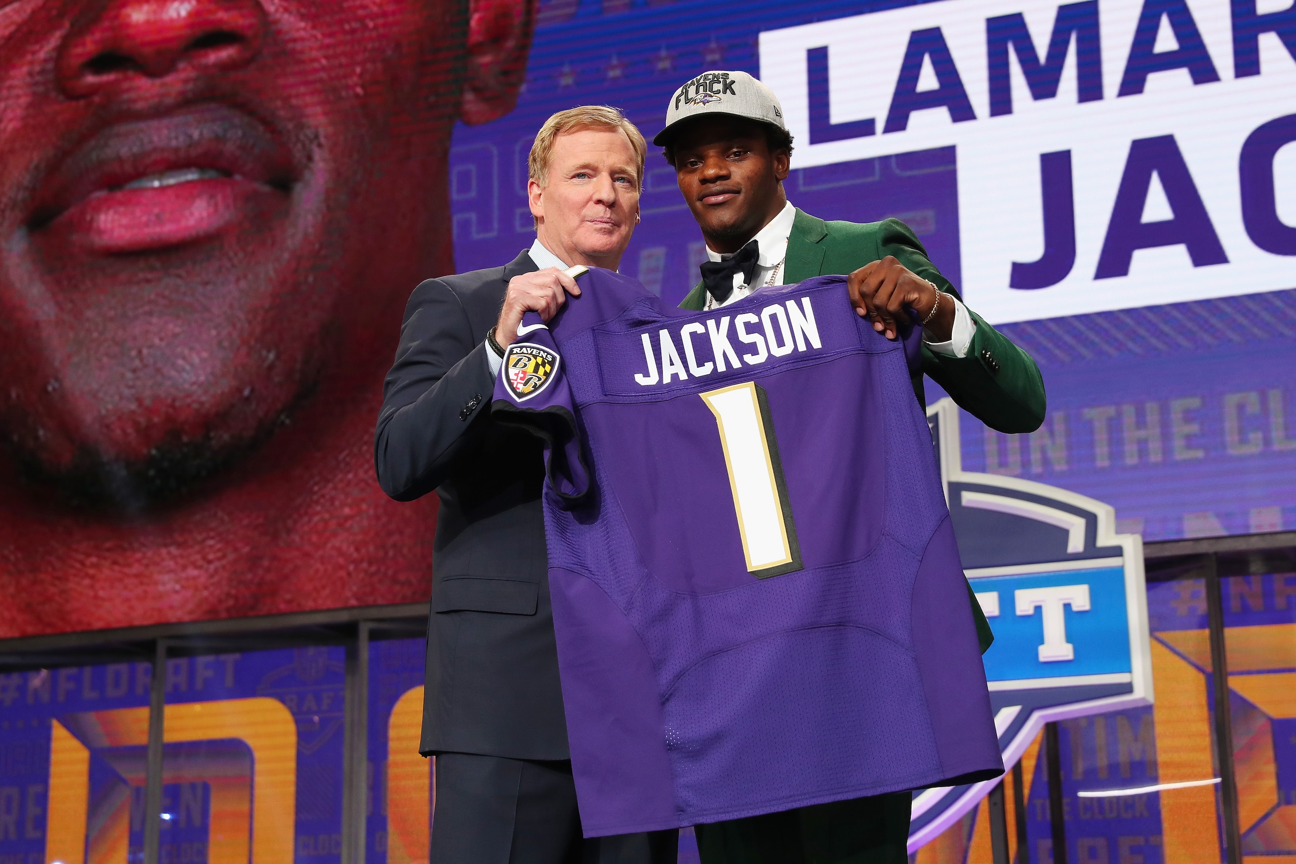 ARLINGTON, TX - APRIL 26:  Lamar Jackson of Louisville poses with NFL Commissioner Roger Goodell after being picked #32 overall by the Baltimore Ravens during the first round of the 2018 NFL Draft at AT&T Stadium on April 26, 2018 in Arlington, Texas.  (P