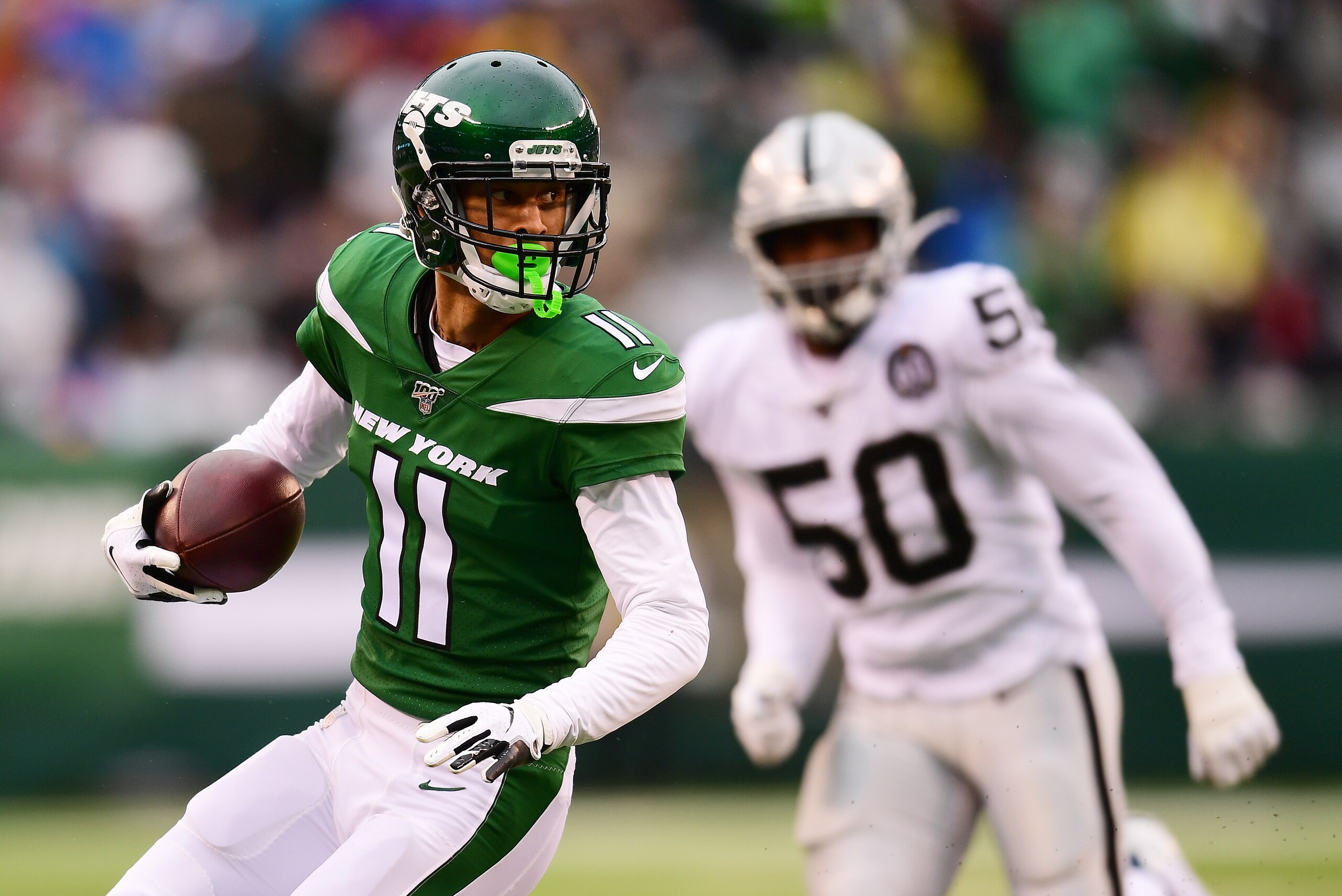 EAST RUTHERFORD, NEW JERSEY - NOVEMBER 24: Robby Anderson #11 of the New York Jets runs the ball during the second half of their game against the Oakland Raiders at MetLife Stadium on November 24, 2019 in East Rutherford, New Jersey. (Photo by Emilee Chin