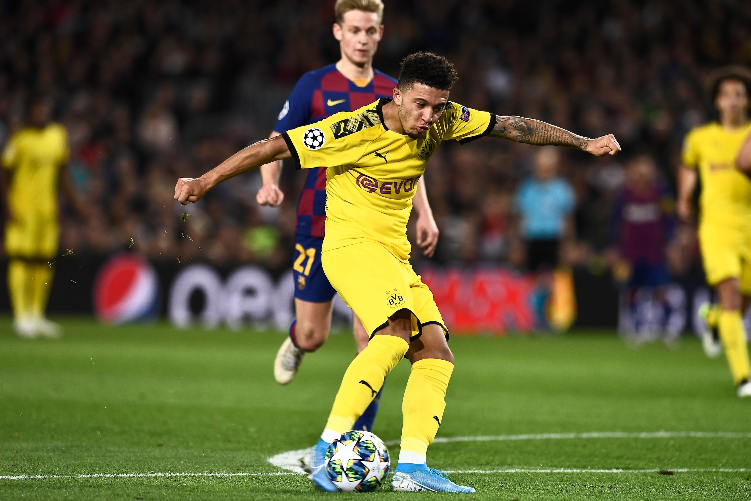 Dortmund's English midfielder Jadon Sancho kicks the ball to score during the UEFA Champions League Group F football match between FC Barcelona and Borussia Dortmund at the Camp Nou stadium in Barcelona, on November 27, 2019. (Photo by Josep LAGO / AFP) (