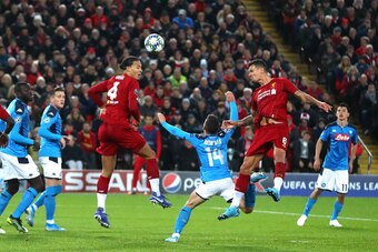 LIVERPOOL, ENGLAND - NOVEMBER 27: Dejan Lovren of Liverpool scores his teams first goal during the UEFA Champions League group E match between Liverpool FC and SSC Napoli at Anfield on November 27, 2019 in Liverpool, United Kingdom. (Photo by Chloe Knott 