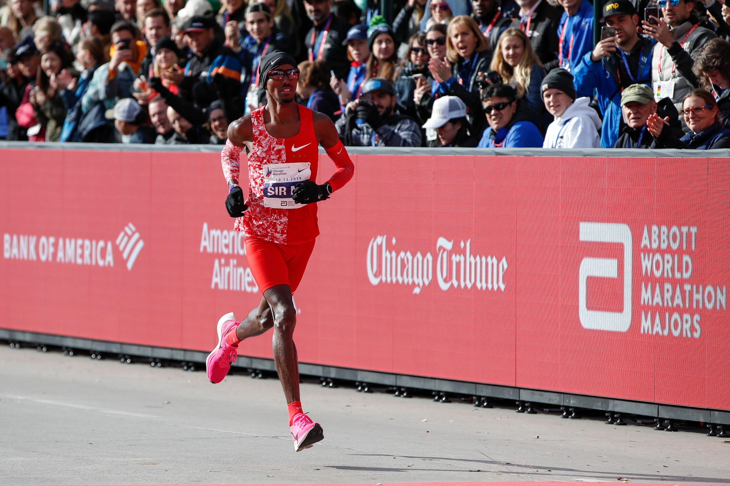 British distance runner Mo Farah competes during the 2019 Bank of America Chicago Marathon on October 13, 2019 in Chicago, Illinois. - Kenya's Lawrence Cherono won a men's race that came down to the wire in 2:05:45 -- barely edging Ethiopia's Dejene Debel