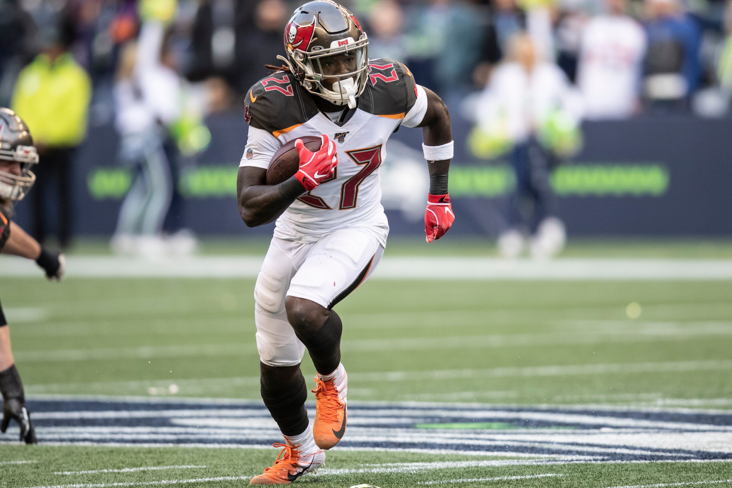 SEATTLE, WA - NOVEMBER 3: Running back Ronald Jones II #27 of the Tampa Bay Buccaneers runs with the ball during a game against the Seattle Seahawks at CenturyLink Field on November 3, 2019 in Seattle, Washington. The Seahawks won 40-34 in overtime. (Phot