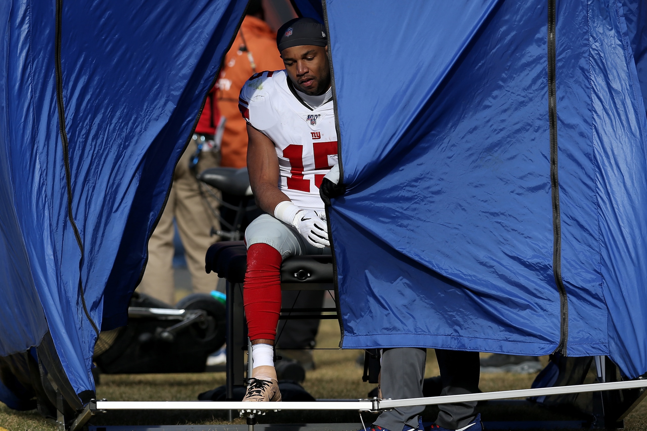 CHICAGO, ILLINOIS - NOVEMBER 24: Golden Tate #15 of the New York Giants is tested for a concussion after taking a hit in the first quarter against the Chicago Bears at Soldier Field on November 24, 2019 in Chicago, Illinois. (Photo by Dylan Buell/Getty Im