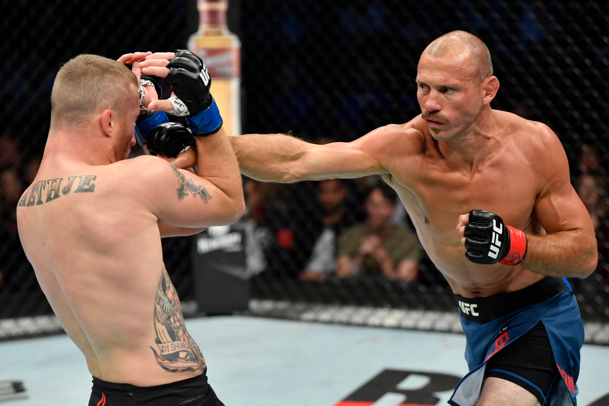 VANCOUVER, BRITISH COLUMBIA - SEPTEMBER 14:  (R-L) Donald Cerrone punches Justin Gaethje in their lightweight bout during the UFC Fight Night event at Rogers Arena on September 14, 2019 in Vancouver, Canada. (Photo by Jeff Bottari/Zuffa LLC/Zuffa LLC)