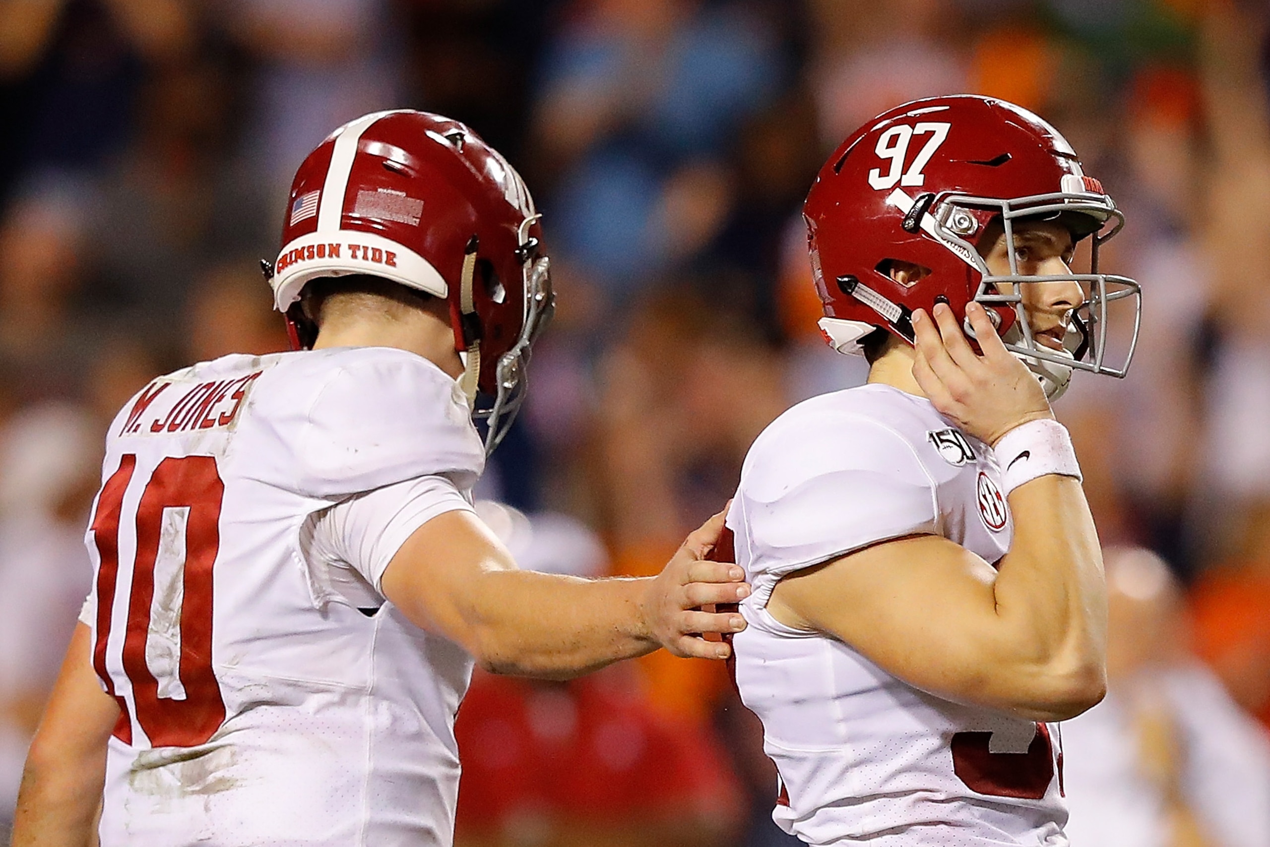 AUBURN, ALABAMA - NOVEMBER 30:  Joseph Bulovas #97 of the Alabama Crimson Tide reacts after missing a game-tying field goal in the final minutes of their 48-45 loss to the Auburn Tigers with Mac Jones #10 at Jordan Hare Stadium on November 30, 2019 in Aub