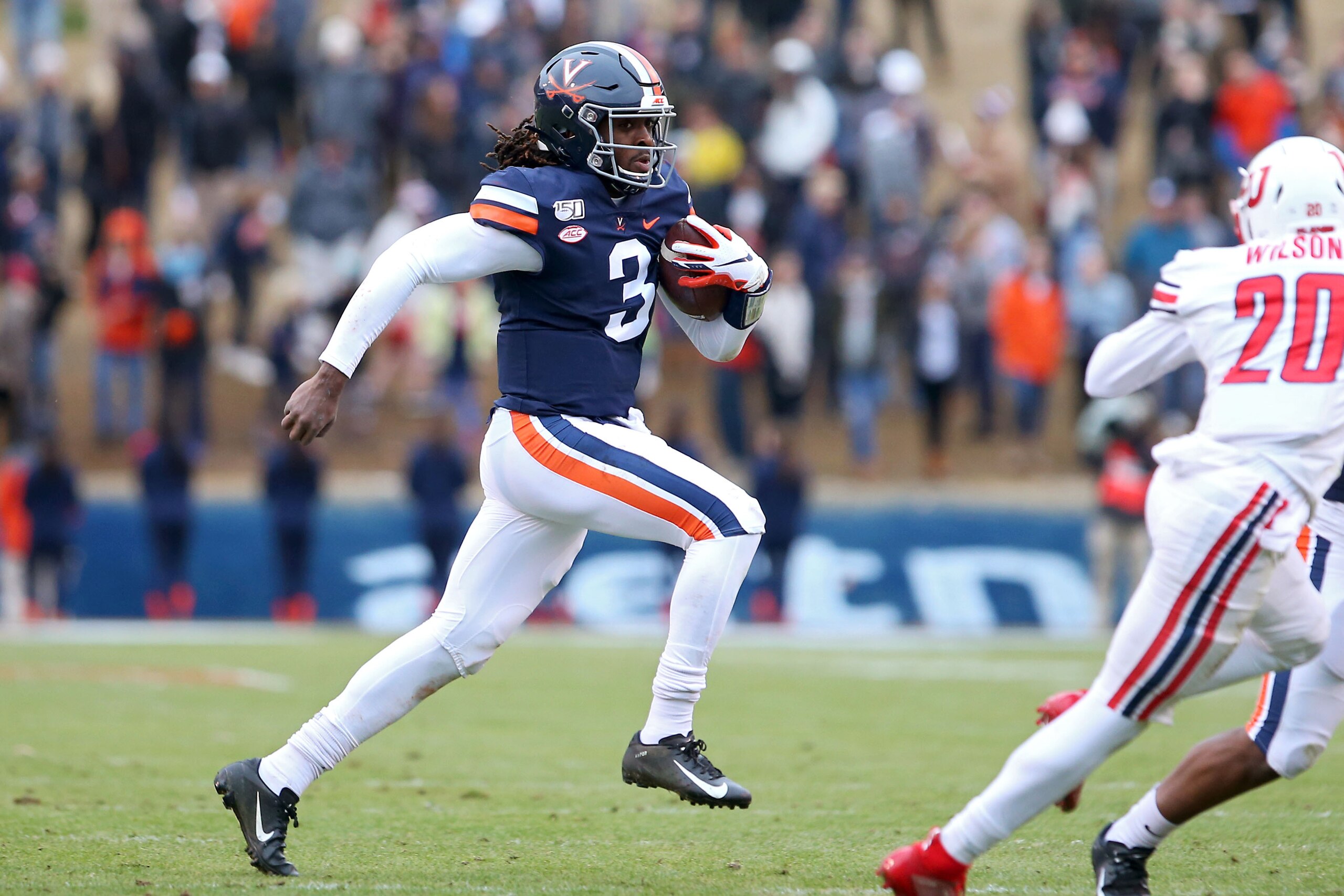 CHARLOTTESVILLE, VA - NOVEMBER 23: Bryce Perkins #3 of the Virginia Cavaliers rushes in the first half during a game against the Liberty Flames at Scott Stadium on November 23, 2019 in Charlottesville, Virginia. (Photo by Ryan M. Kelly/Getty Images)
