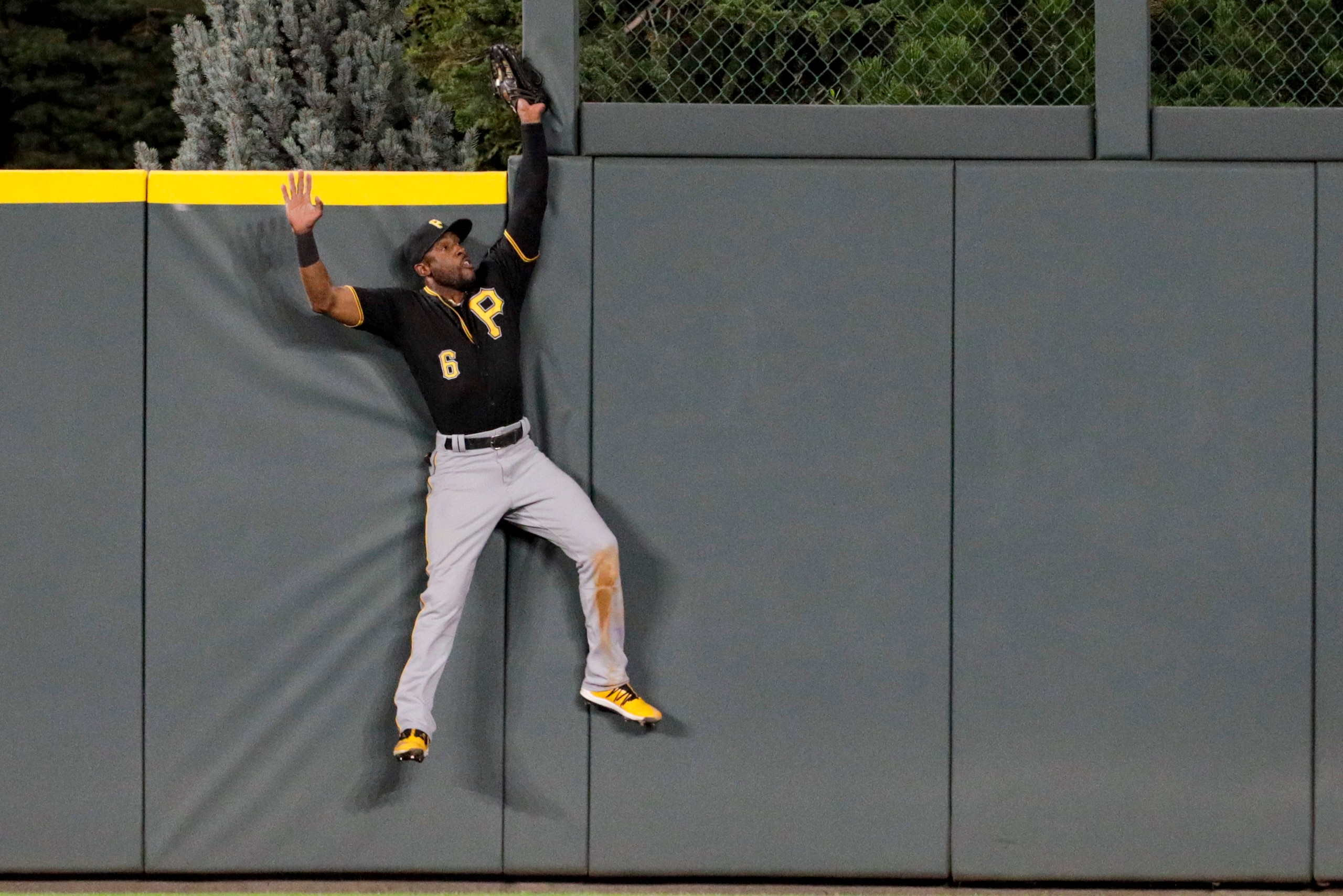 DENVER, CO - AUGUST 29: Starling Marte #6 of the Pittsburgh Pirates catches a fly ball off the bat of Nolan Arenado of the Colorado Rockies to end the fifth inning at Coors Field on August 29, 2019 in Denver, Colorado. (Photo by Joe Mahoney/Getty Images)