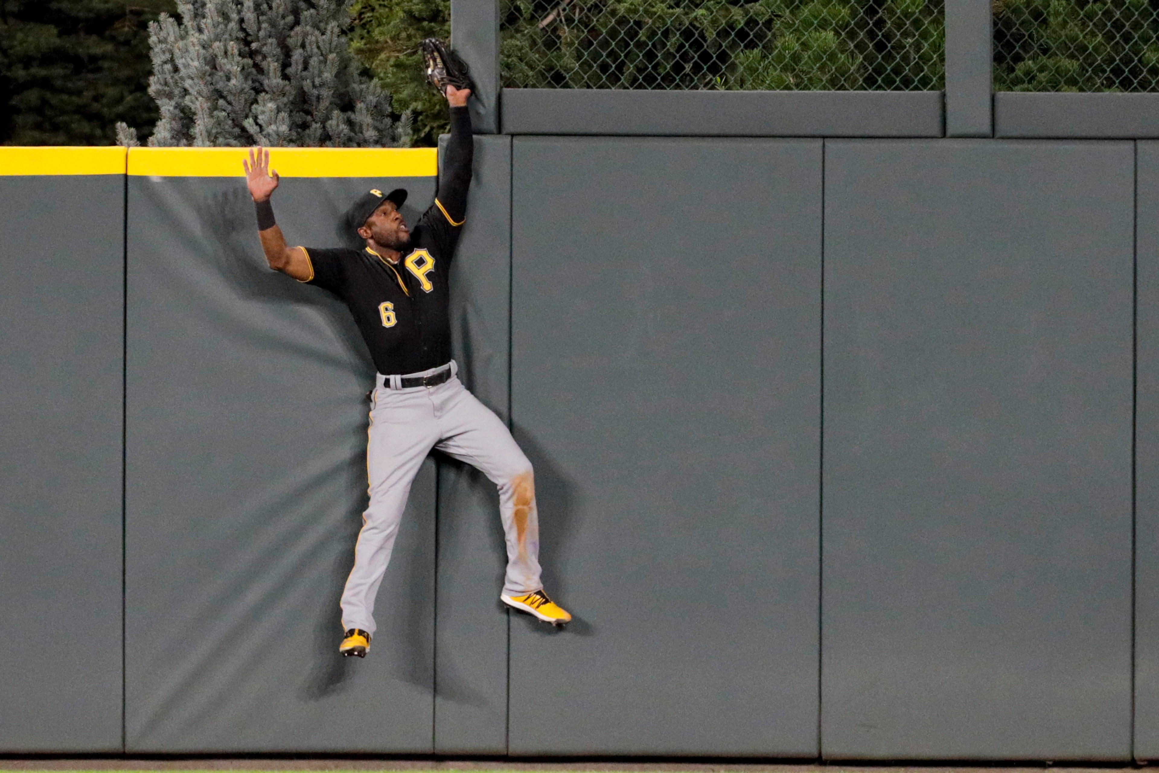 DENVER, CO - AUGUST 29: Starling Marte #6 of the Pittsburgh Pirates catches a fly ball off the bat of Nolan Arenado of the Colorado Rockies to end the fifth inning at Coors Field on August 29, 2019 in Denver, Colorado. (Photo by Joe Mahoney/Getty Images)