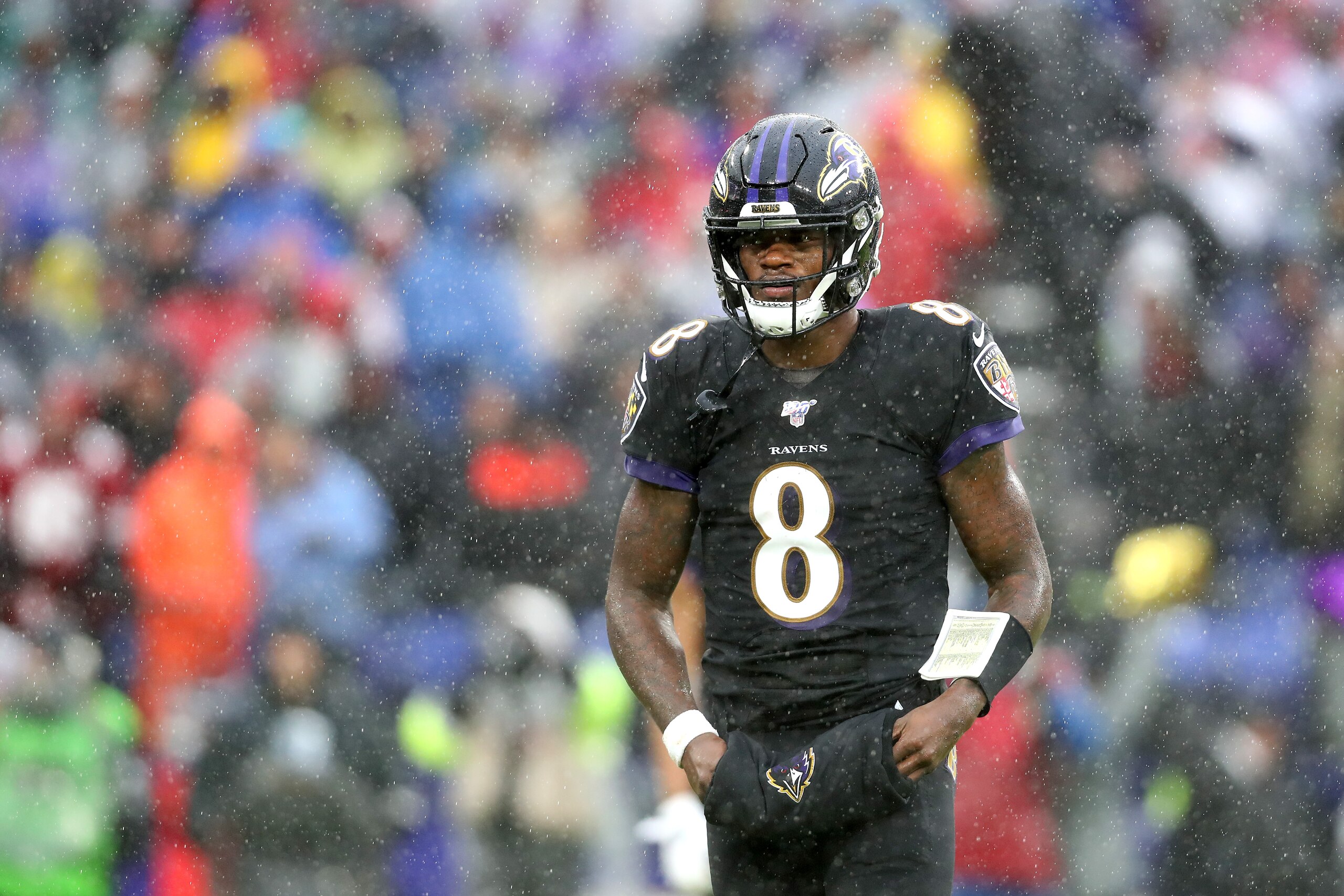 BALTIMORE, MARYLAND - DECEMBER 01: Quarterback Lamar Jackson #8 of the Baltimore Ravens looks on against the San Francisco 49ers in the first half at M&T Bank Stadium on December 01, 2019 in Baltimore, Maryland. (Photo by Rob Carr/Getty Images) BALTIMORE, MARYLAND - DECEMBER 01: Quarterback Lamar Jackson #8 of the Baltimore Ravens looks on against the San Francisco 49ers in the first half at M&T Bank Stadium on December 01, 2019 in Baltimore, Maryland. (Photo by Rob Carr/Getty Images)